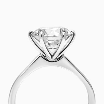 A platinum engagement ring.