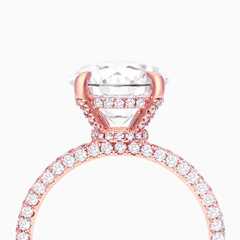 A rose gold engagement ring.