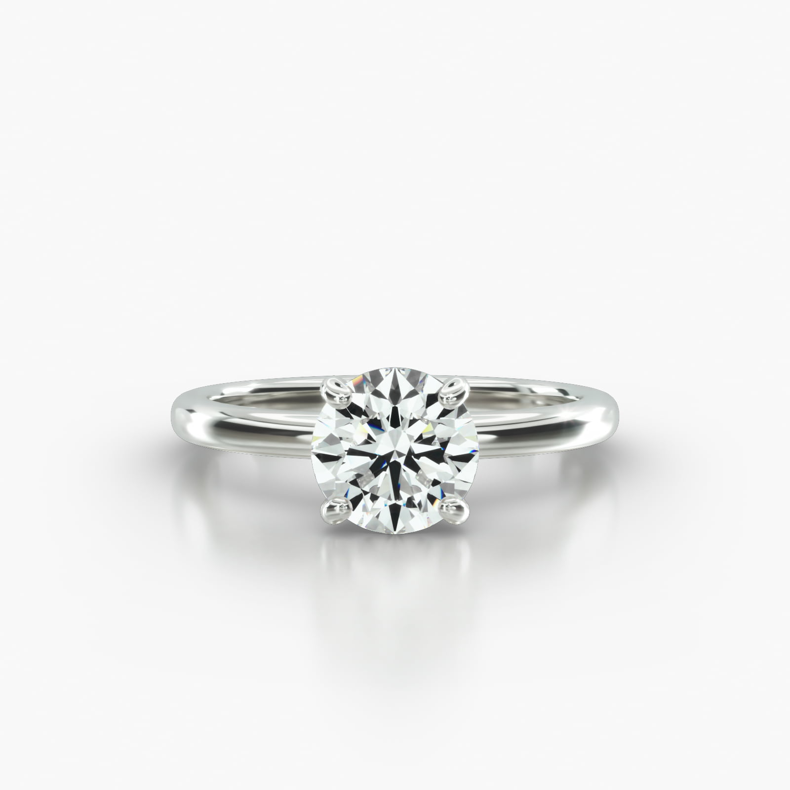 Solitaire Engagement Ring Embellished With a Four Prong Signature Head