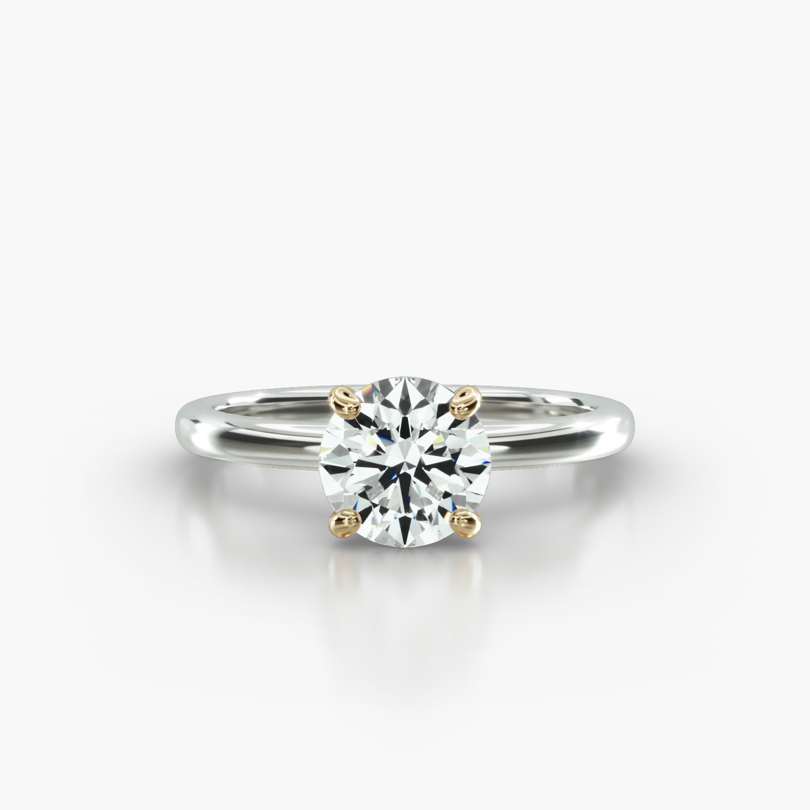 Solitaire Engagement Ring Embellished With a Four Prong Signature Head