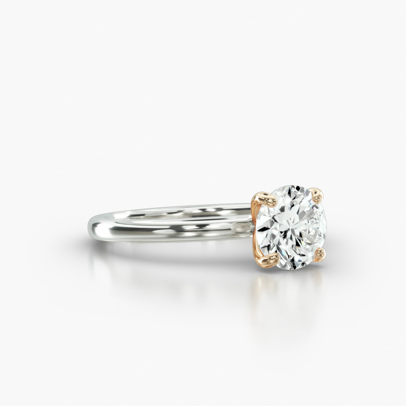 Solitaire Engagement Ring Embellished With a Four Prong Signature Head