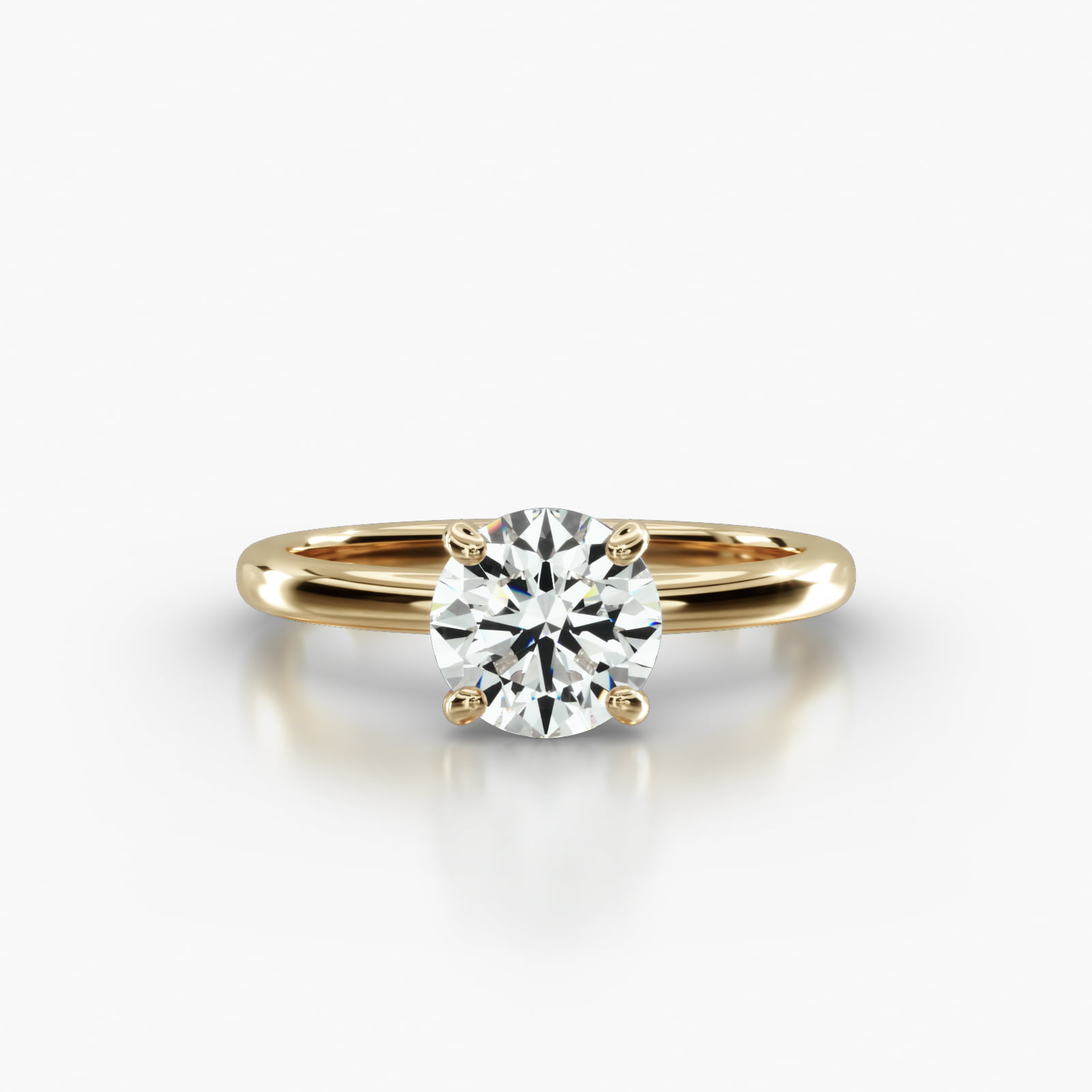Solitaire Engagement Ring Embellished With a Four Prong Signature Head