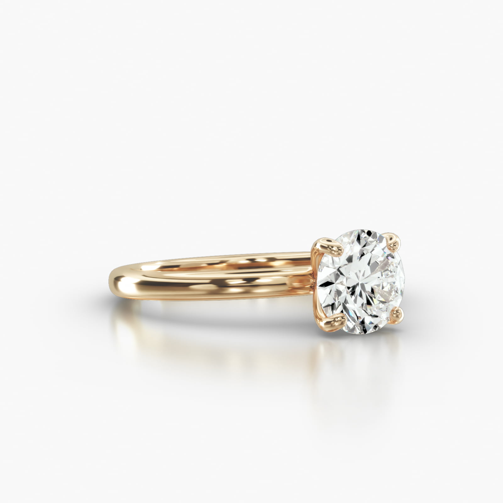 Solitaire Engagement Ring Embellished With a Four Prong Signature Head