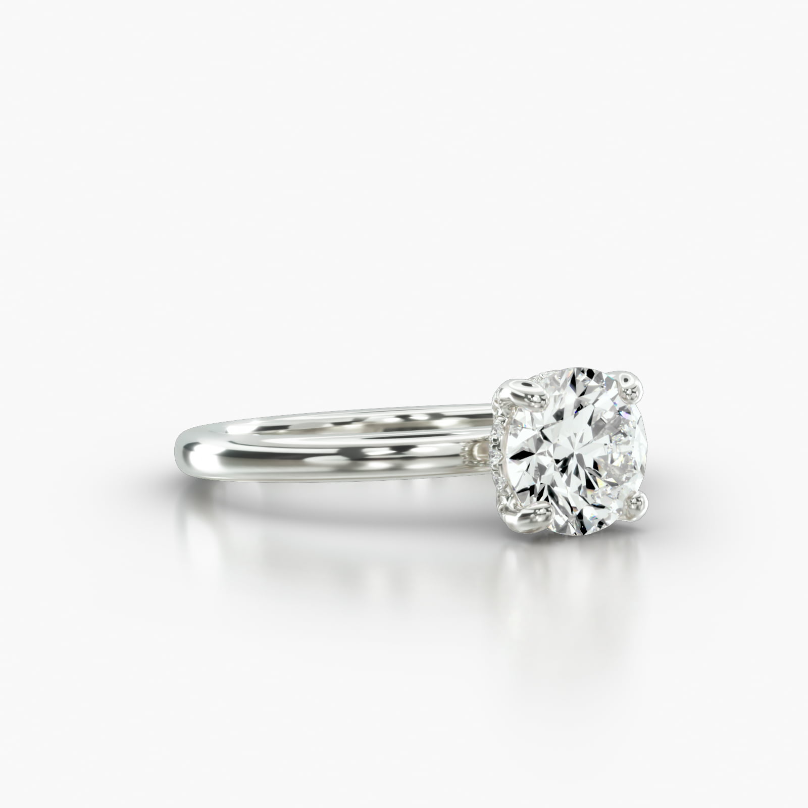Solitaire Engagement Ring Embellished With a Classic Pavé Basket Head