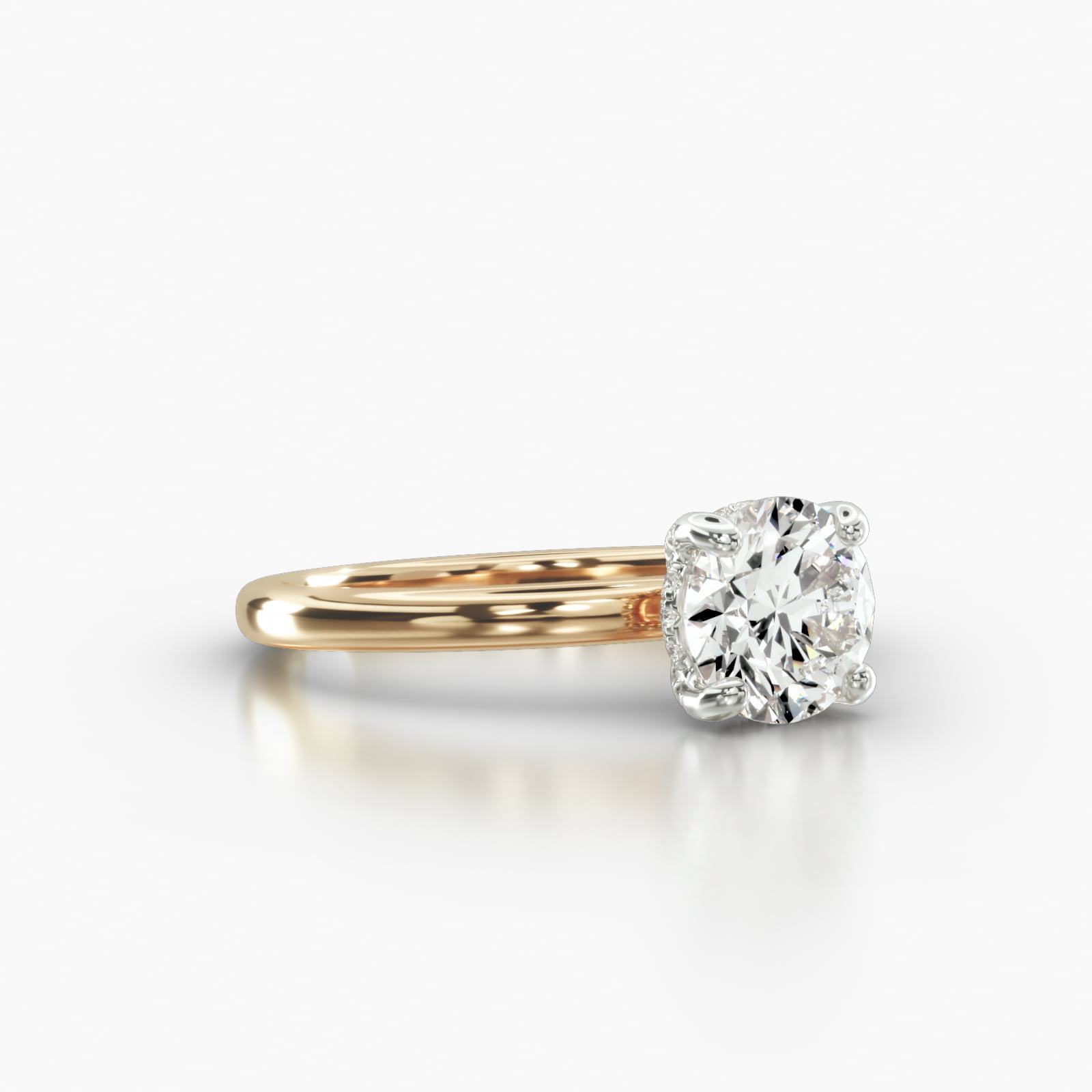 Solitaire Engagement Ring Embellished With a Classic Pavé Basket Head
