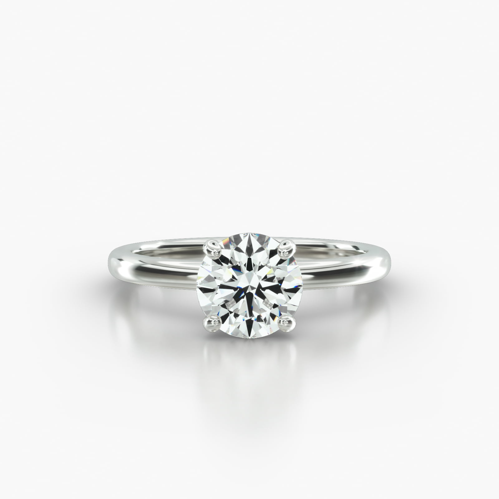 Solitaire Engagement Ring Embellished With a Four Prong Signature Head With Diamond Bridge Accent