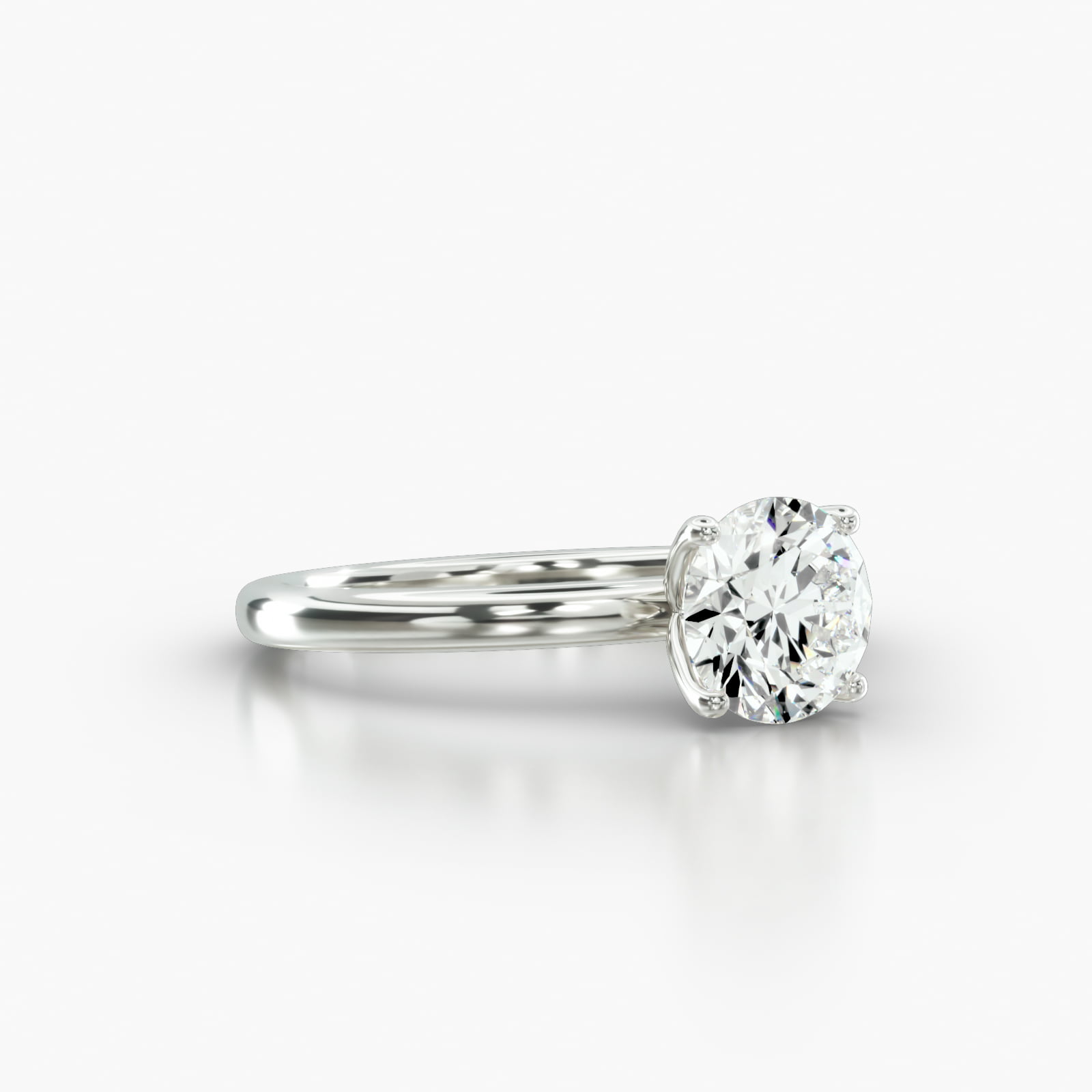 Solitaire Engagement Ring Embellished With a Four Prong Tulip Basket Head