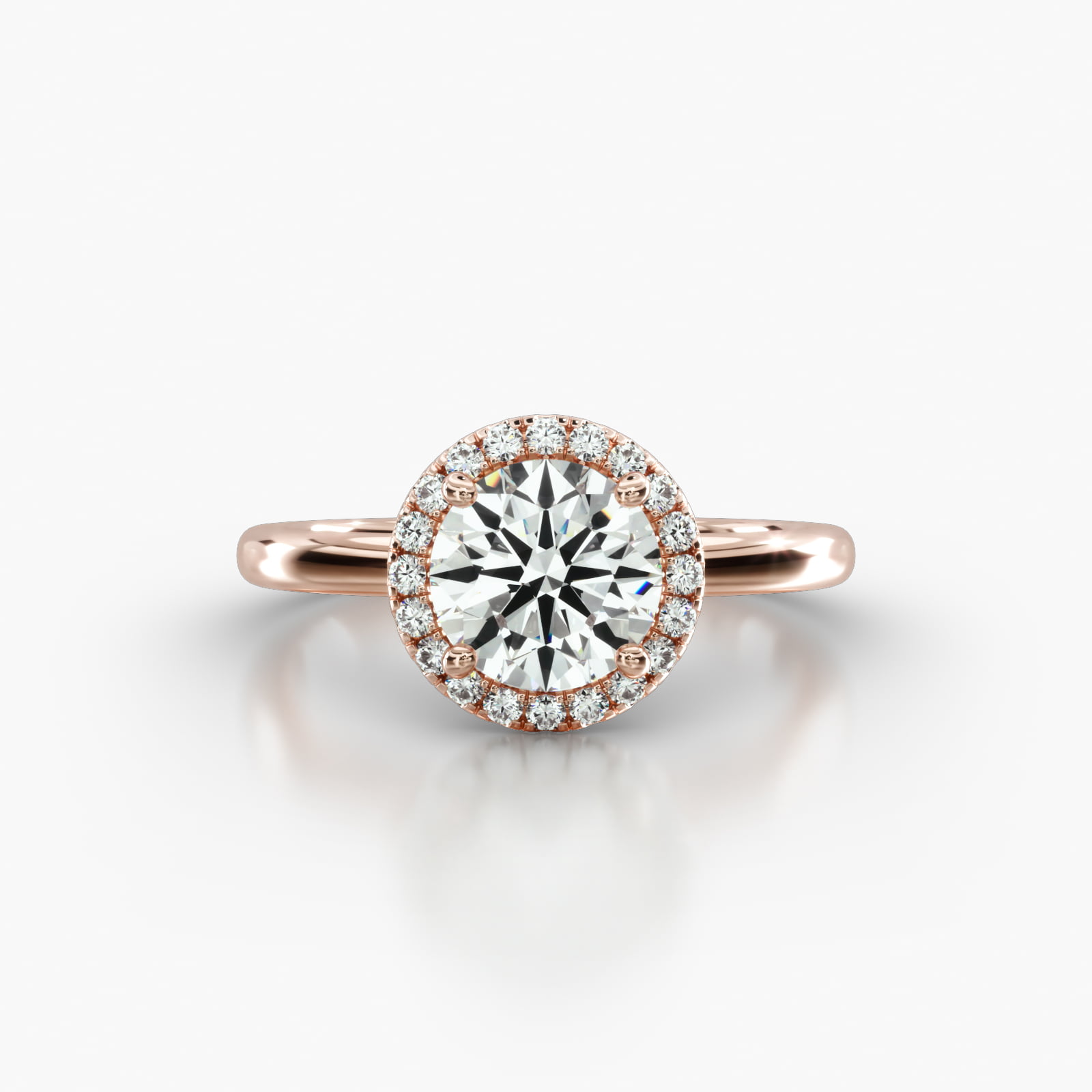Solitaire Engagement Ring Embellished With a Single Row Pavé Halo Head