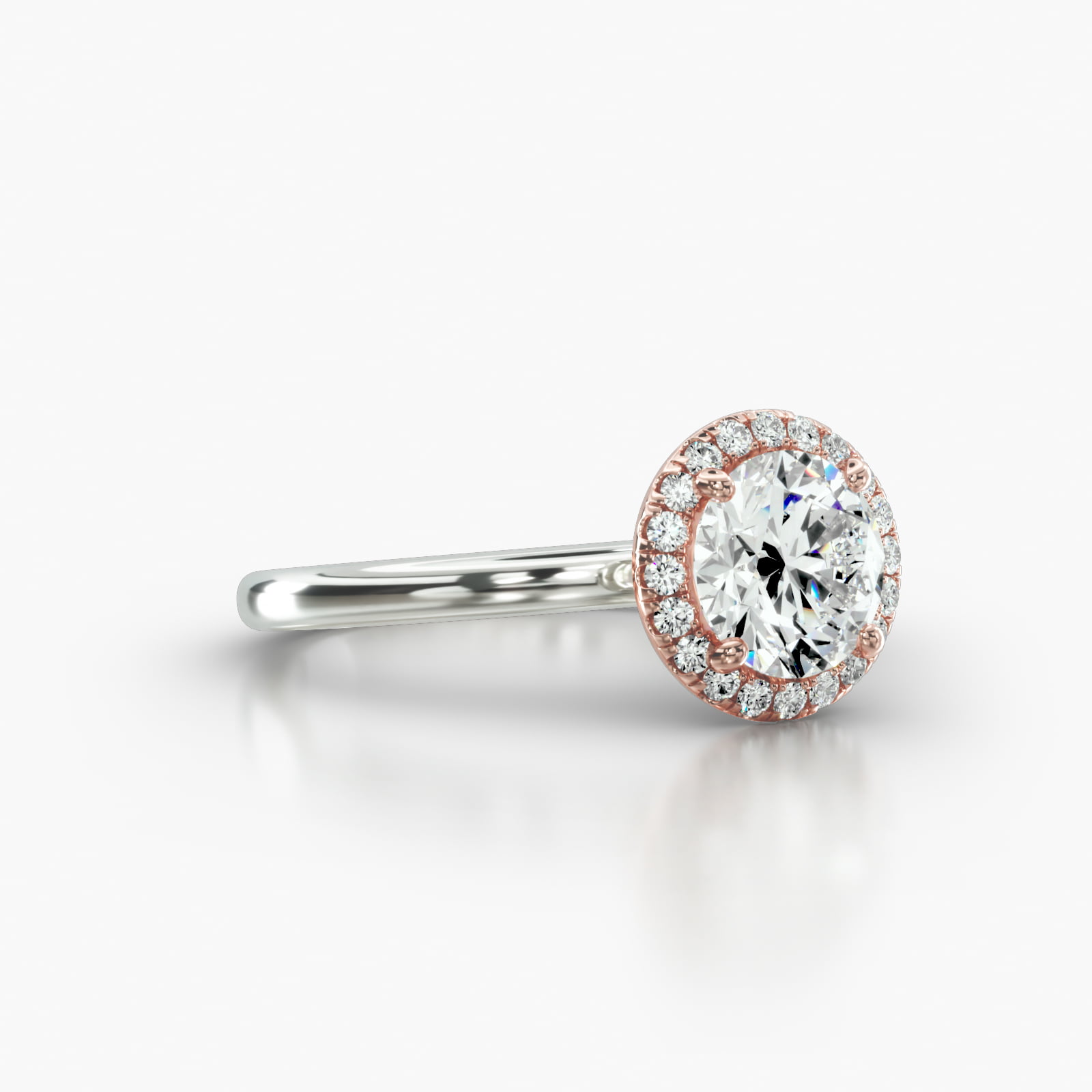 Solitaire Engagement Ring Embellished With a Single Row Pavé Halo Head