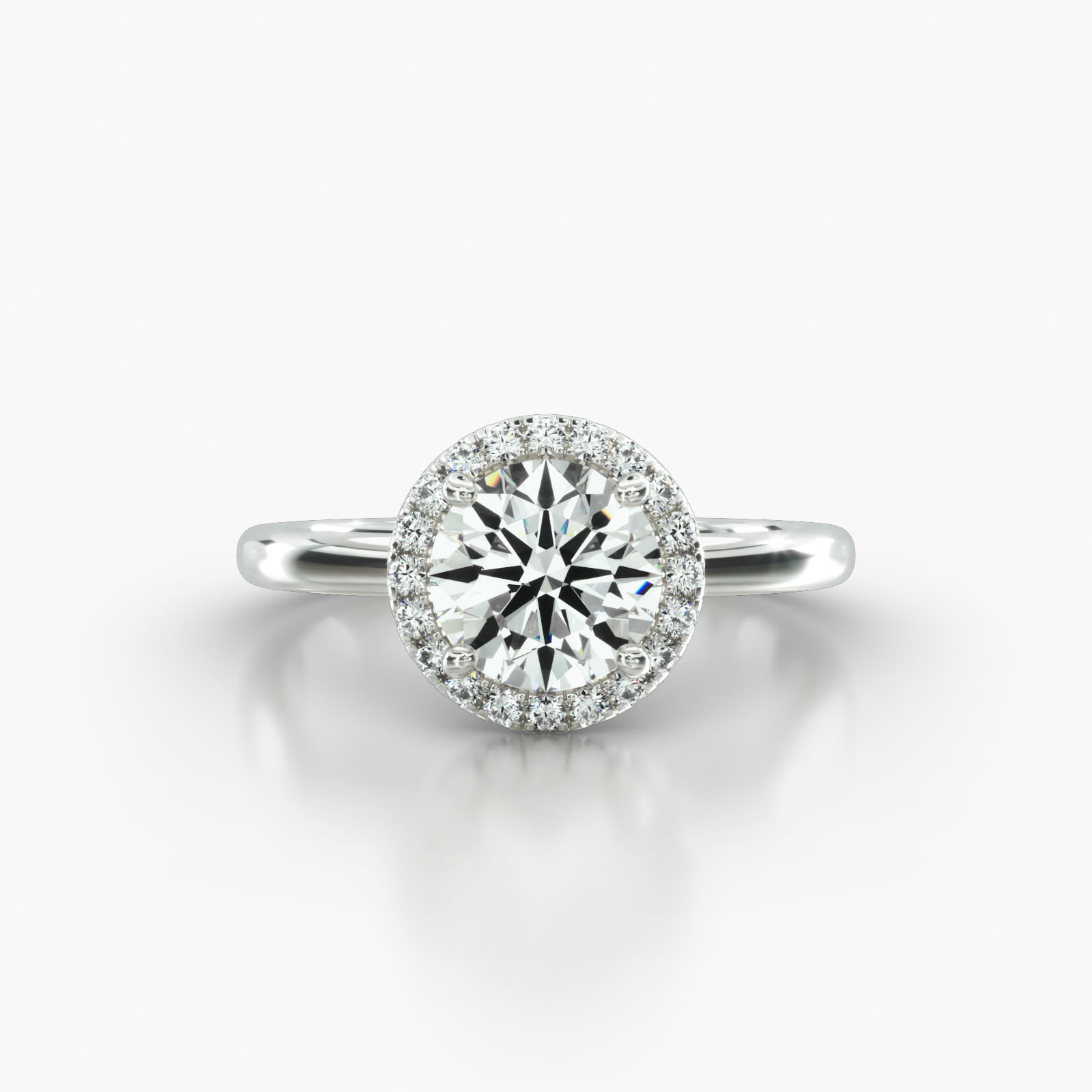 Solitaire Engagement Ring Embellished With a Single Row Pavé Halo Head