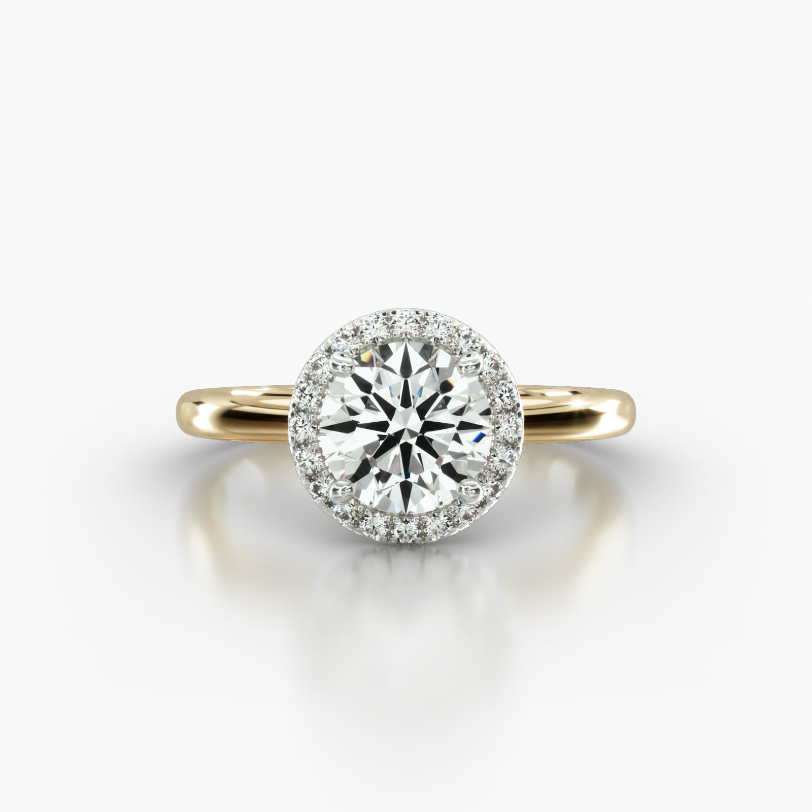 Solitaire Engagement Ring Embellished With a Single Row Pavé Halo Head
