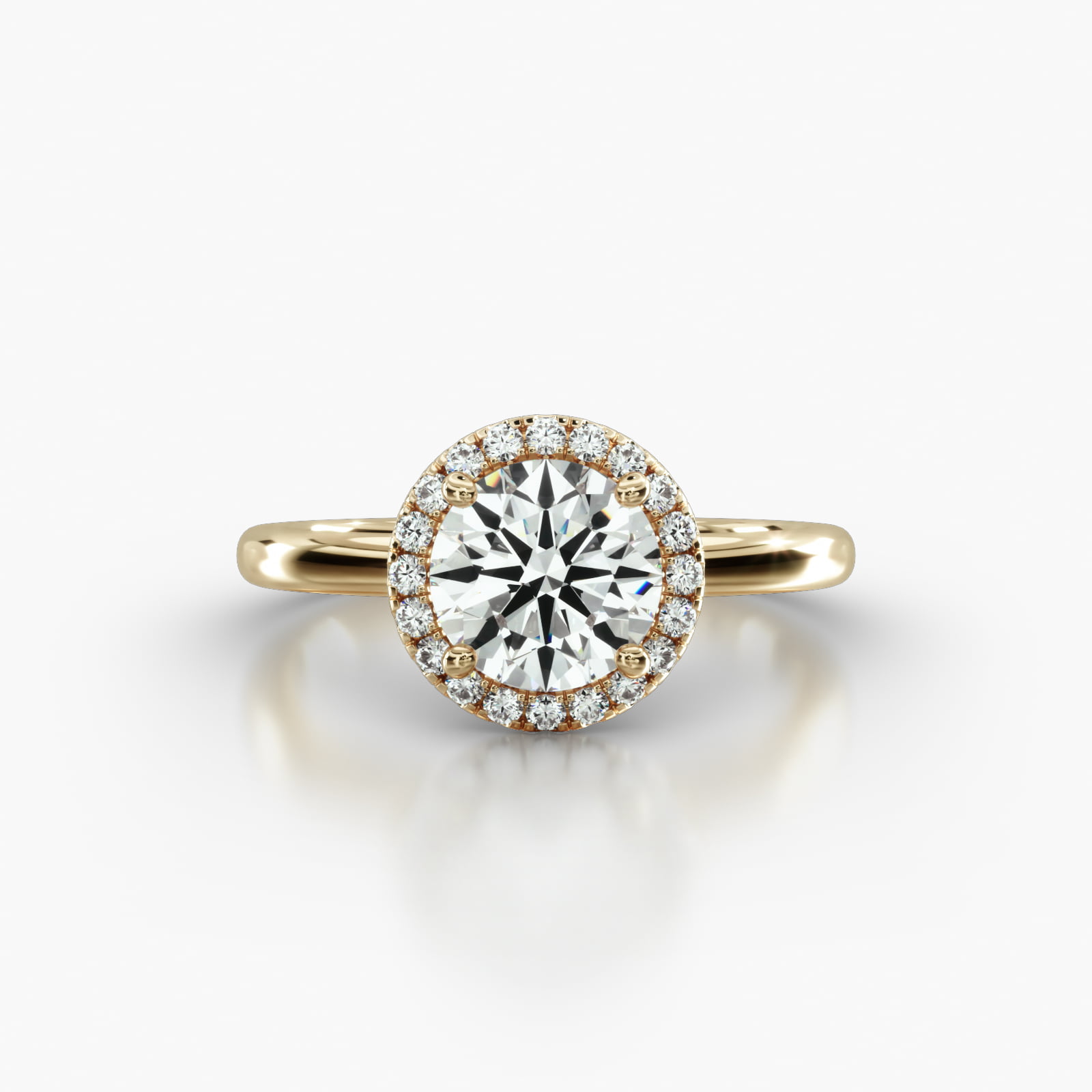 Solitaire Engagement Ring Embellished With a Single Row Pavé Halo Head