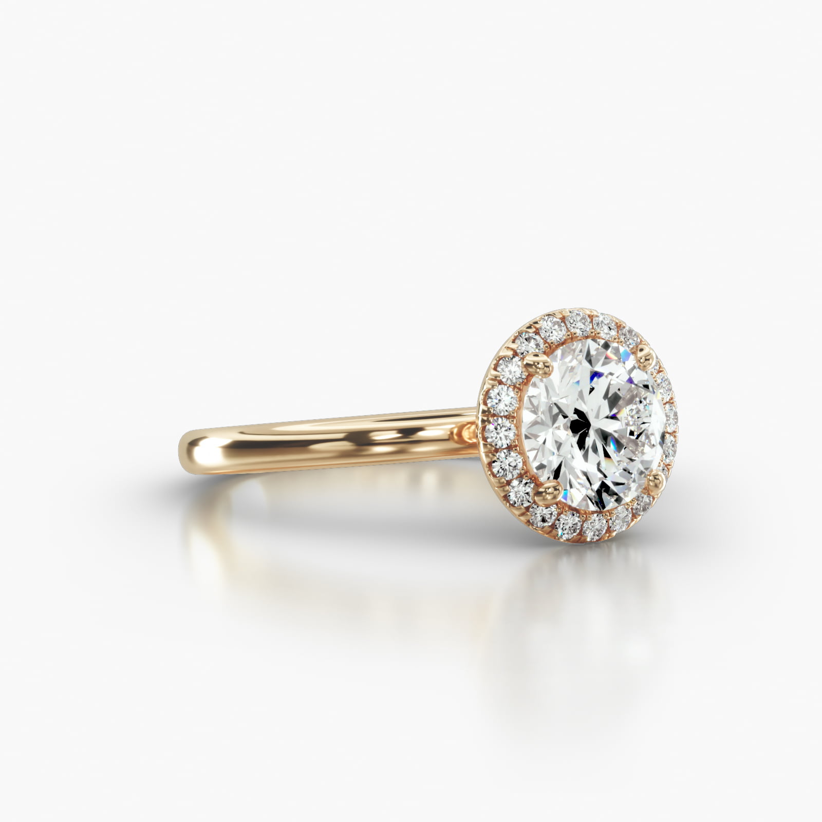 Solitaire Engagement Ring Embellished With a Single Row Pavé Halo Head
