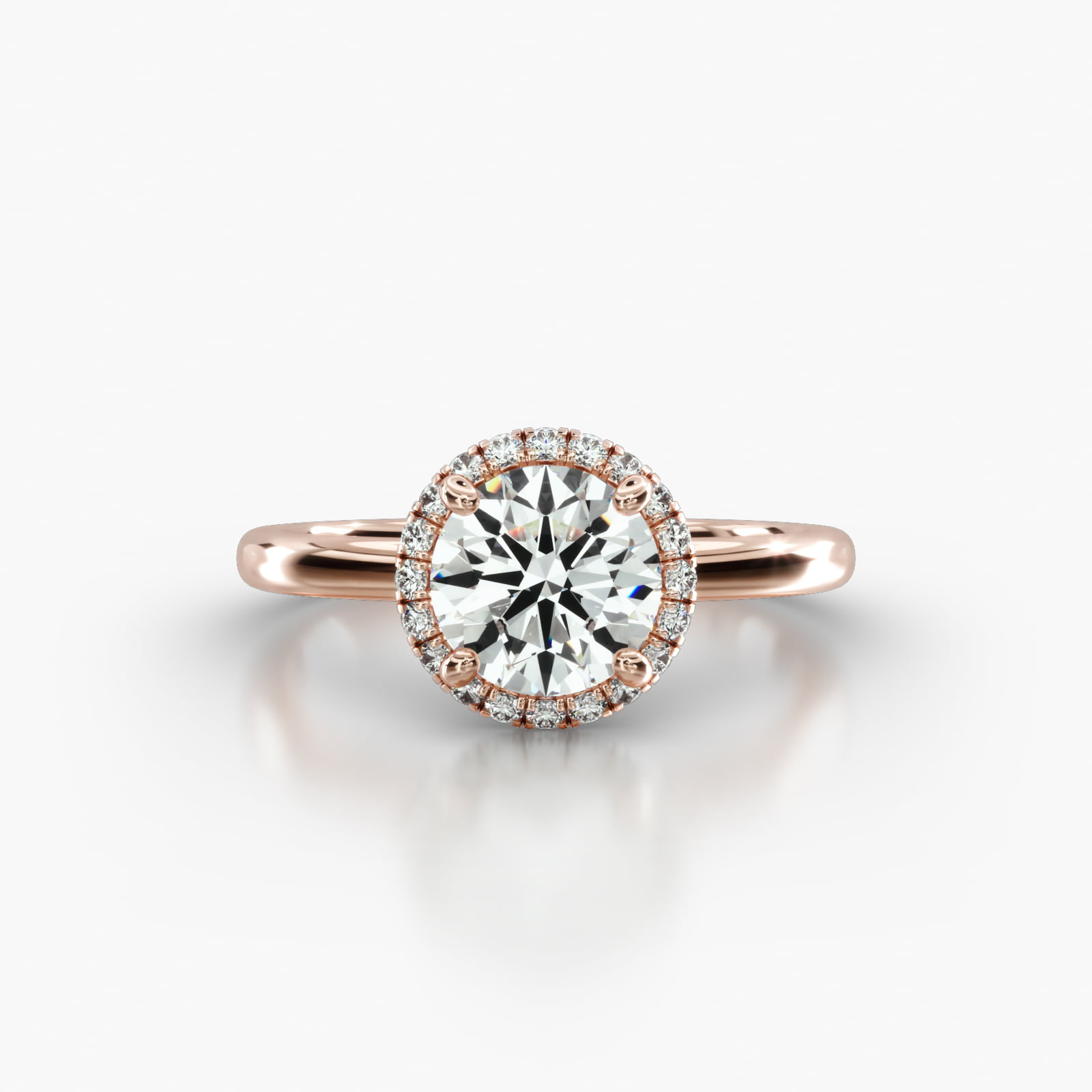 Solitaire Engagement Ring Embellished With a French Pavé Halo Head