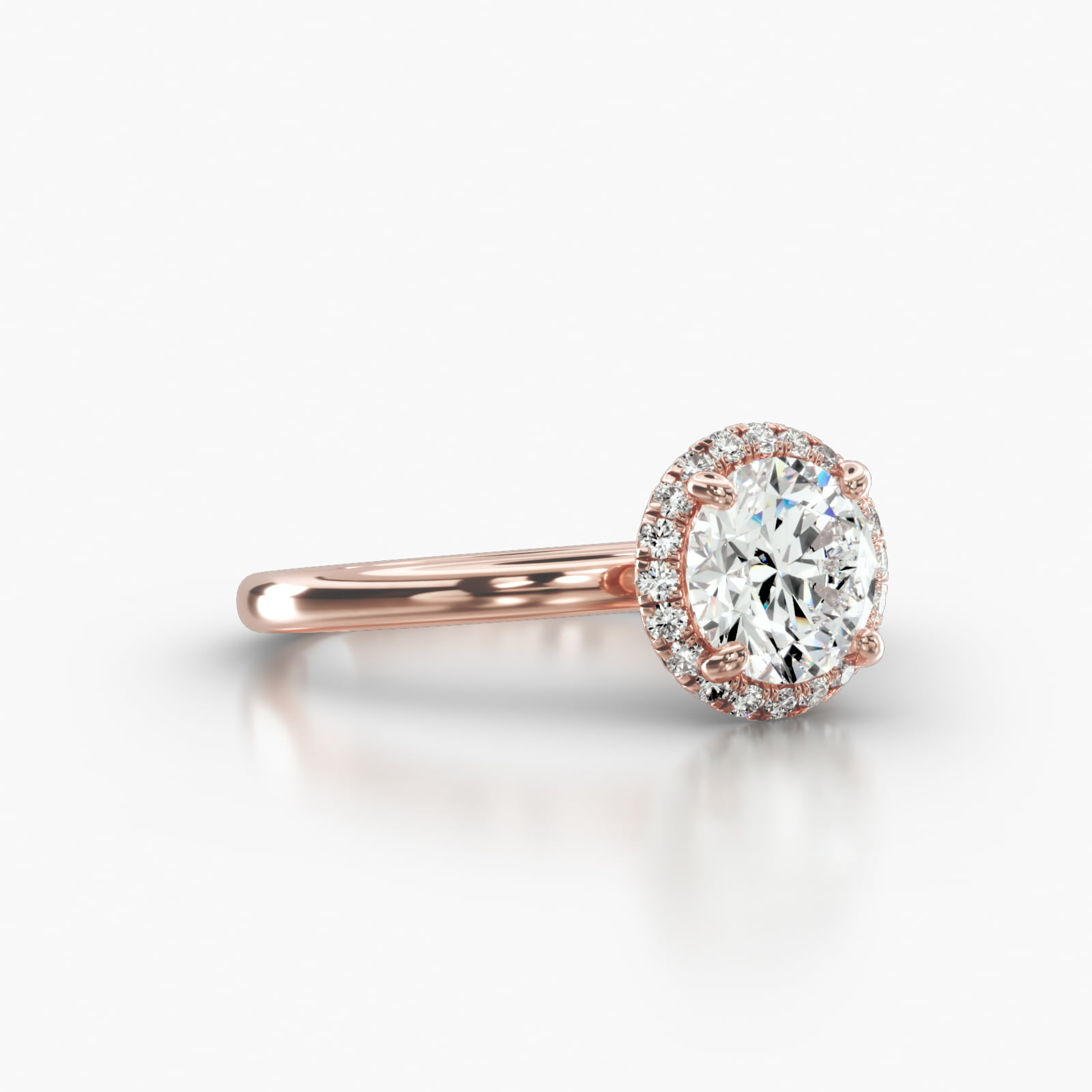 Solitaire Engagement Ring Embellished With a French Pavé Halo Head