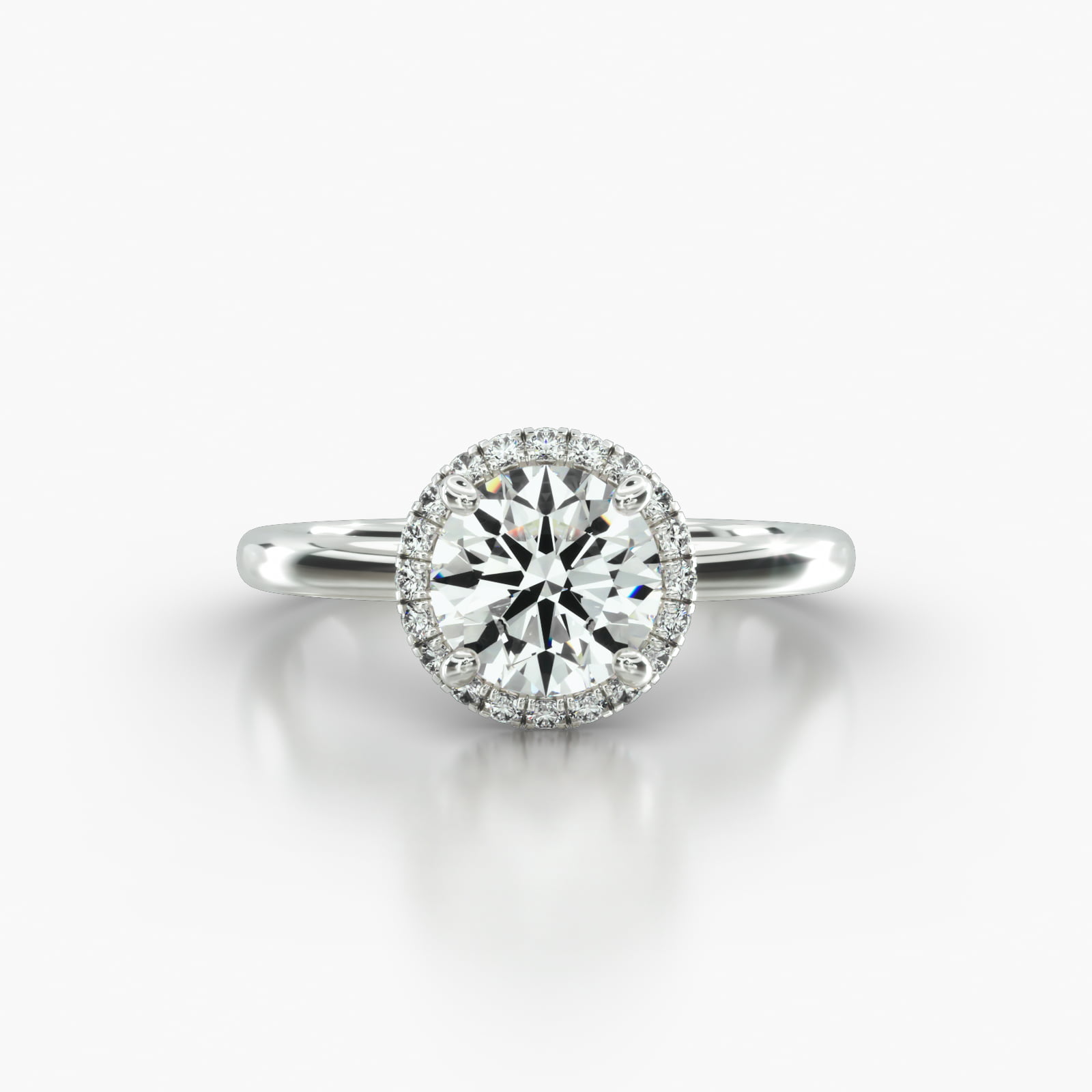 Solitaire Engagement Ring Embellished With a French Pavé Halo Head