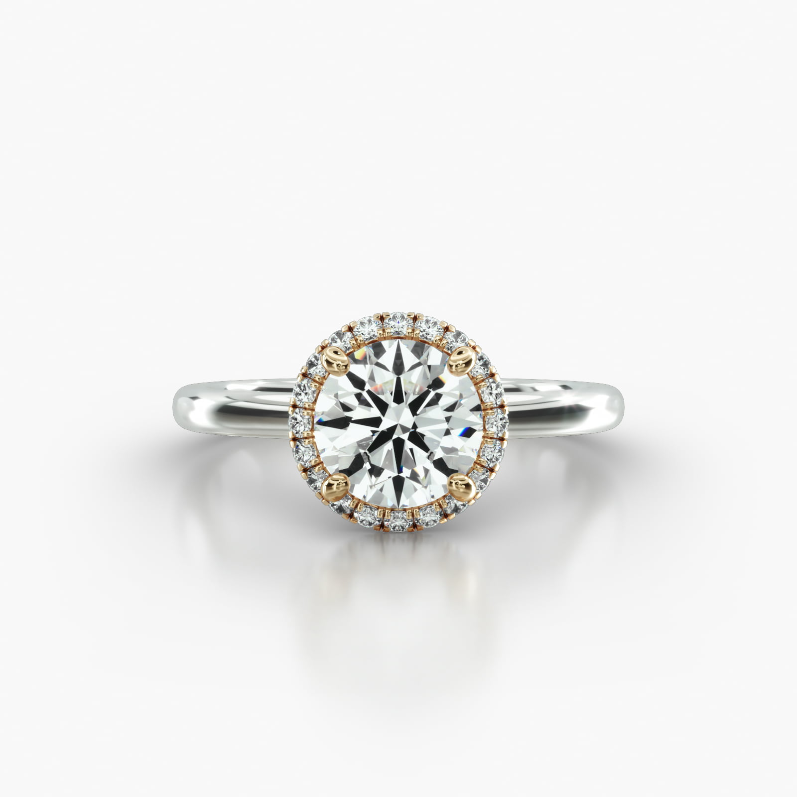 Solitaire Engagement Ring Embellished With a French Pavé Halo Head