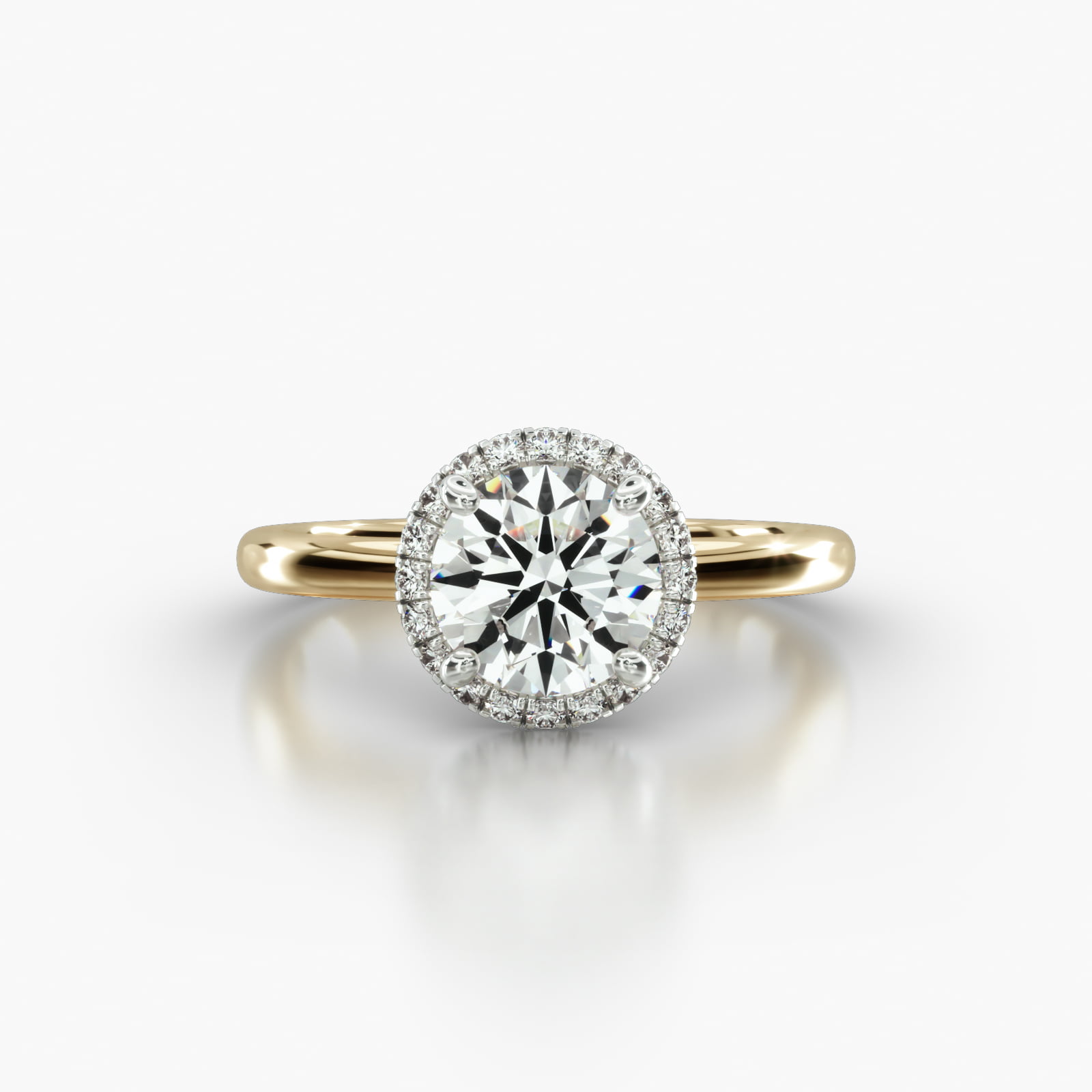 Solitaire Engagement Ring Embellished With a French Pavé Halo Head