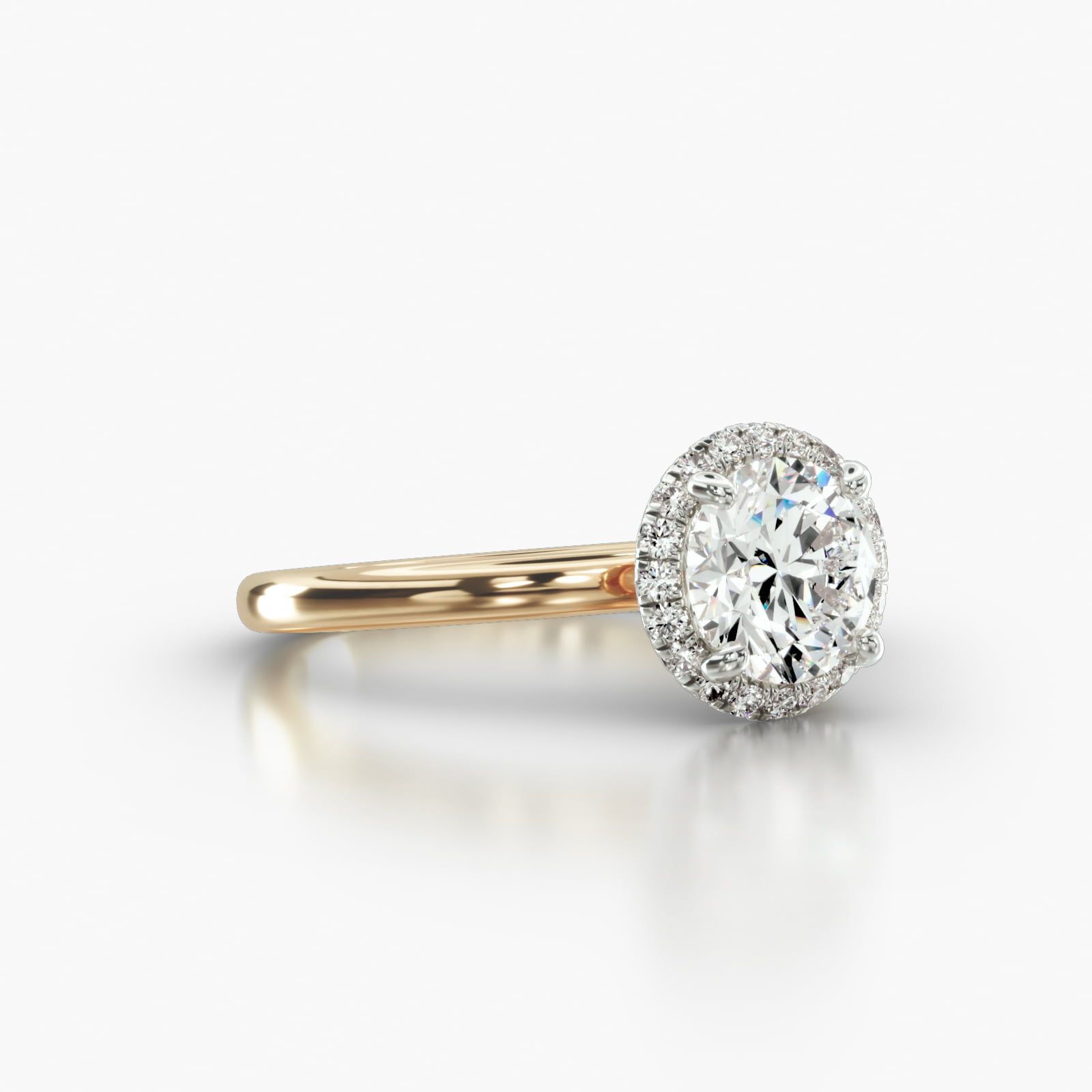 Solitaire Engagement Ring Embellished With a French Pavé Halo Head