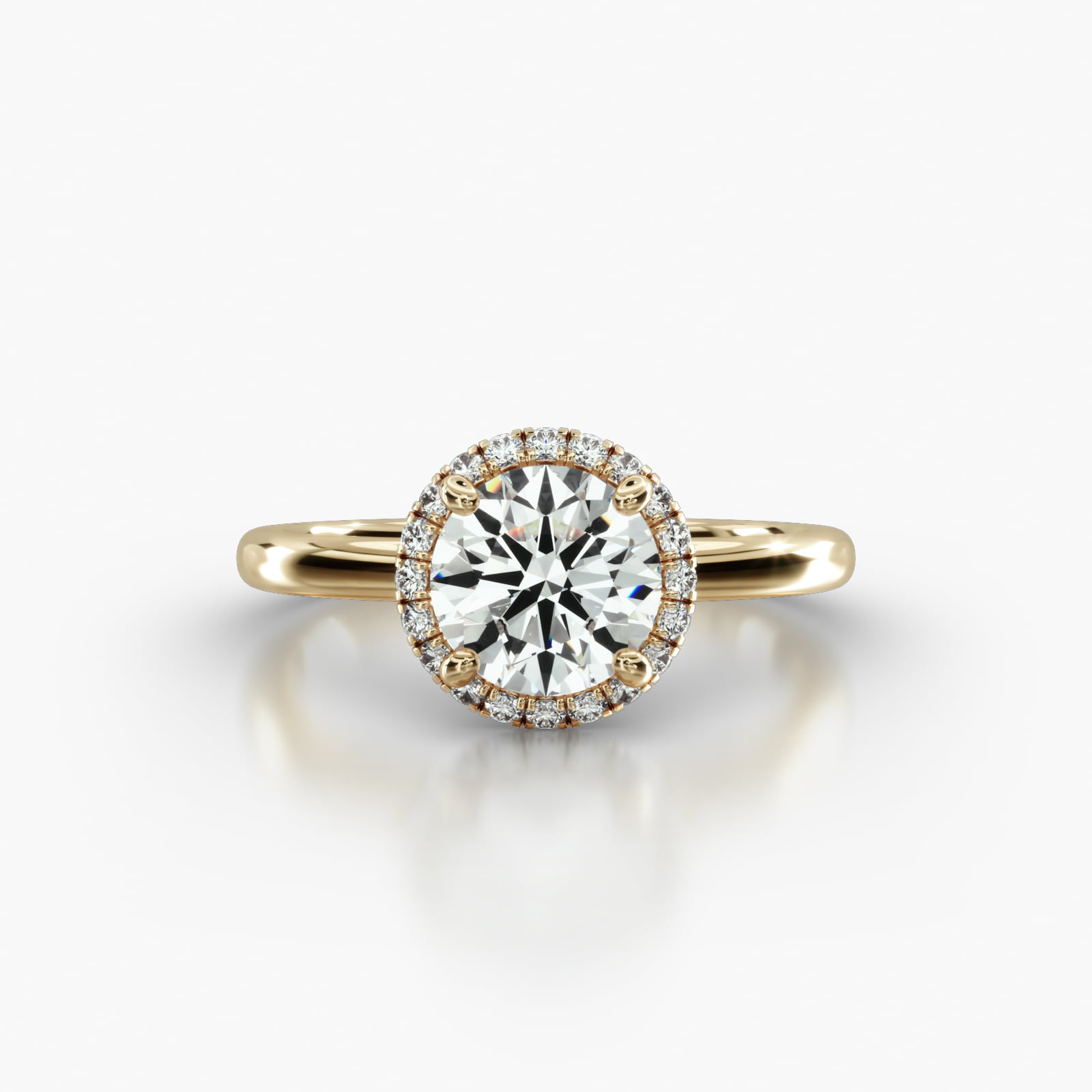 Solitaire Engagement Ring Embellished With a French Pavé Halo Head