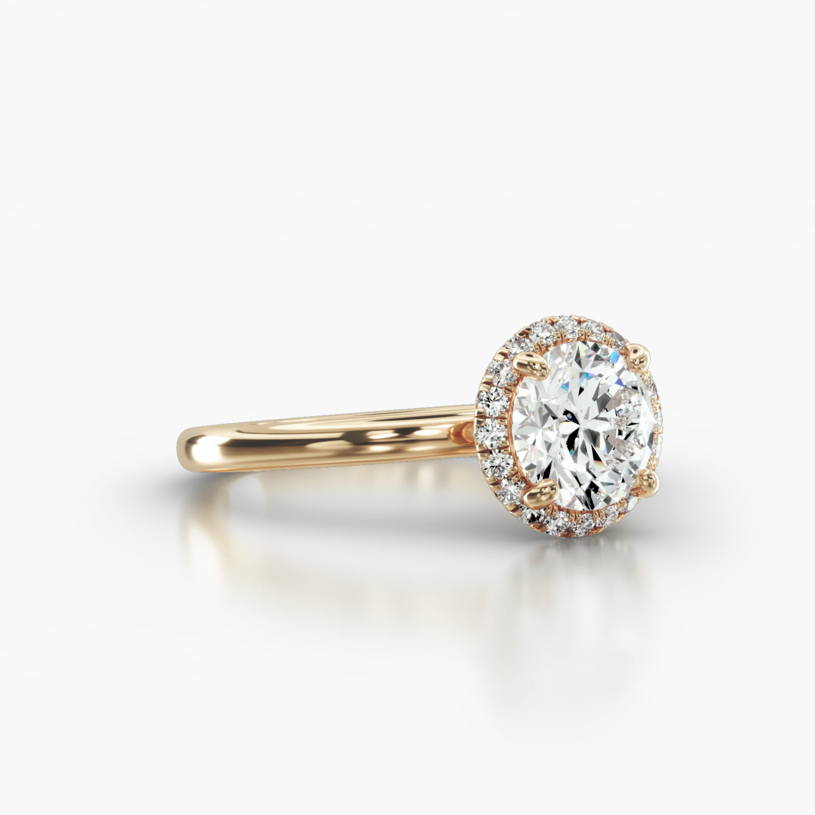 Solitaire Engagement Ring Embellished With a French Pavé Halo Head