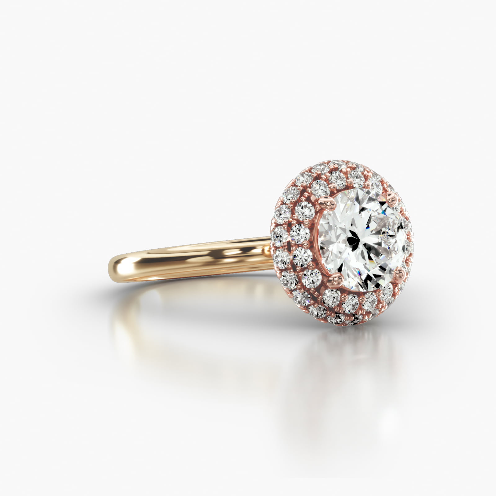 Solitaire Engagement Ring Embellished With a Falling Edge Pavé Halo Head