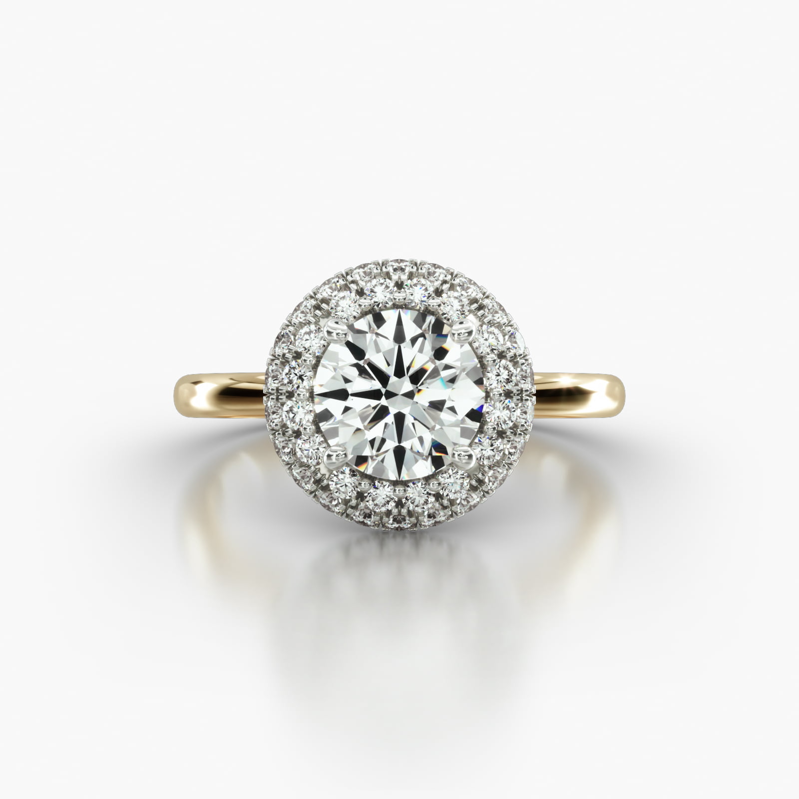 Solitaire Engagement Ring Embellished With a Falling Edge Pavé Halo Head