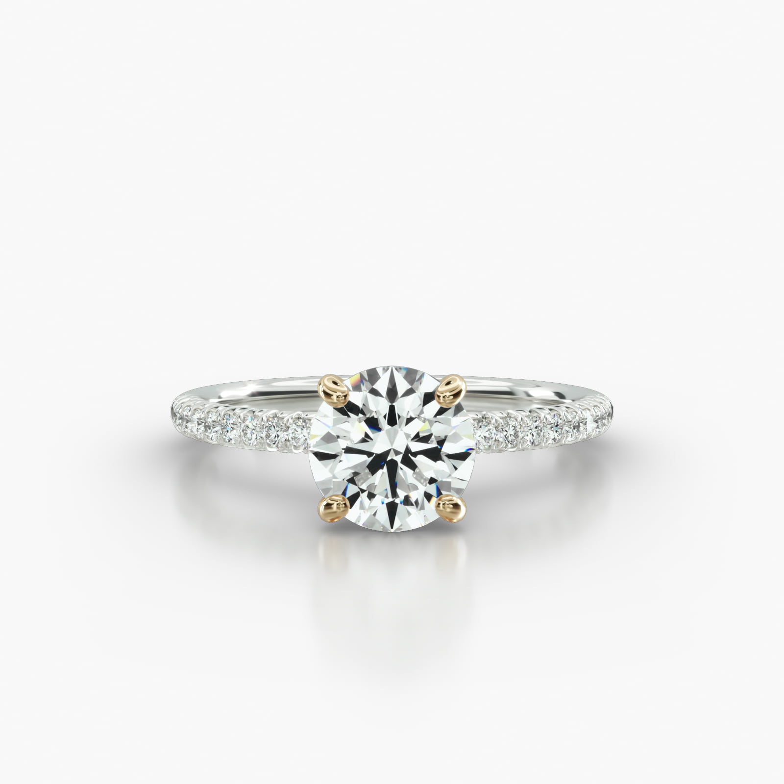 Petite French Pavé Engagement Ring Embellished With a Four Prong Signature Head