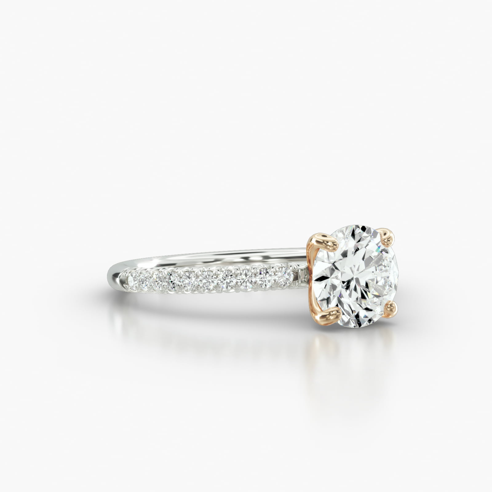 Petite French Pavé Engagement Ring Embellished With a Four Prong Signature Head