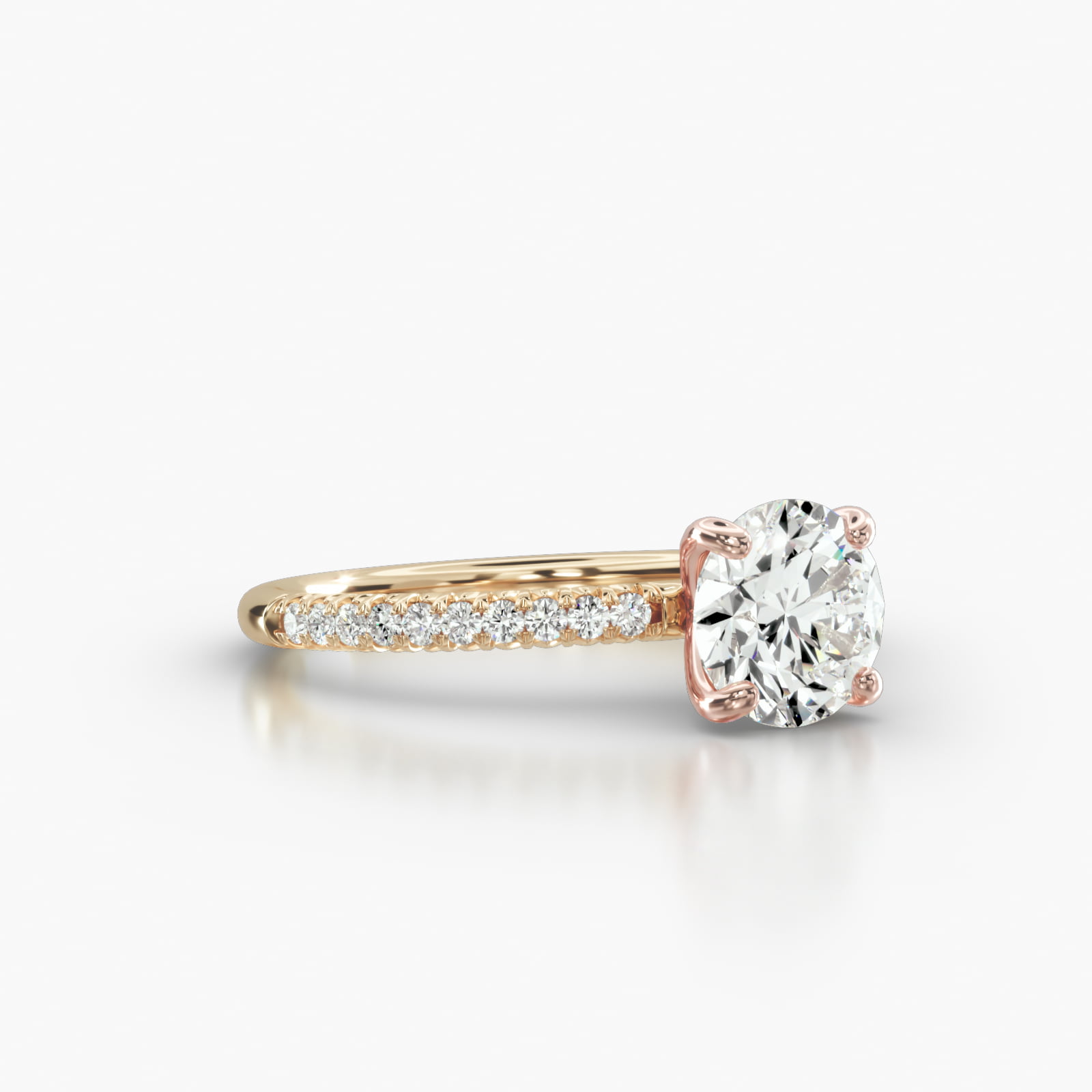Petite French Pavé Engagement Ring Embellished With a Four Prong Signature Head