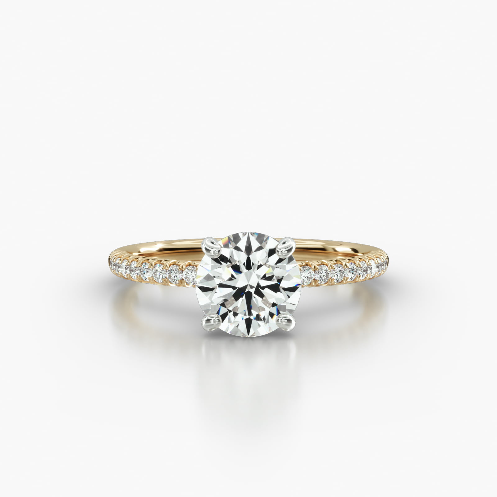 Petite French Pavé Engagement Ring Embellished With a Four Prong Signature Head
