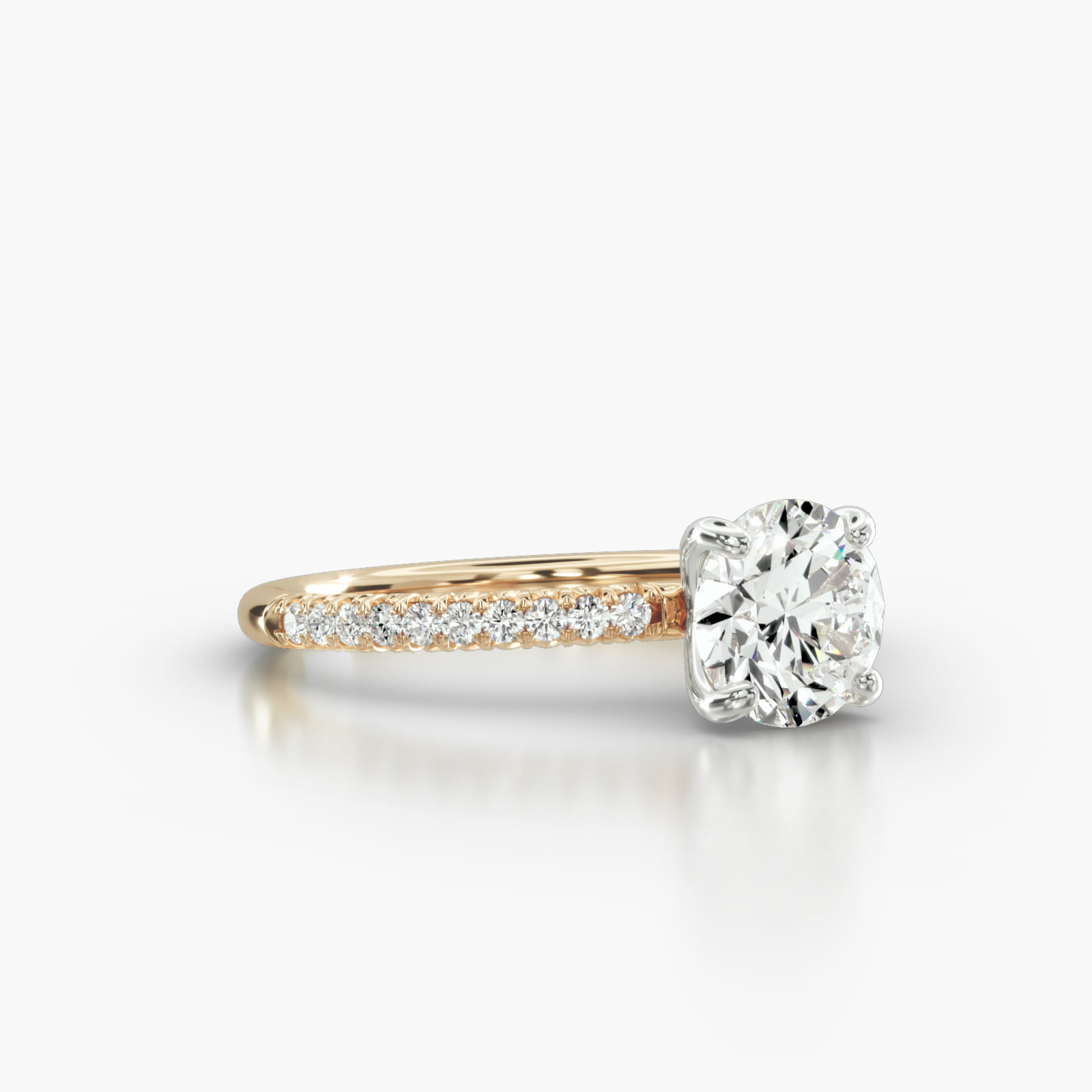 Petite French Pavé Engagement Ring Embellished With a Four Prong Signature Head