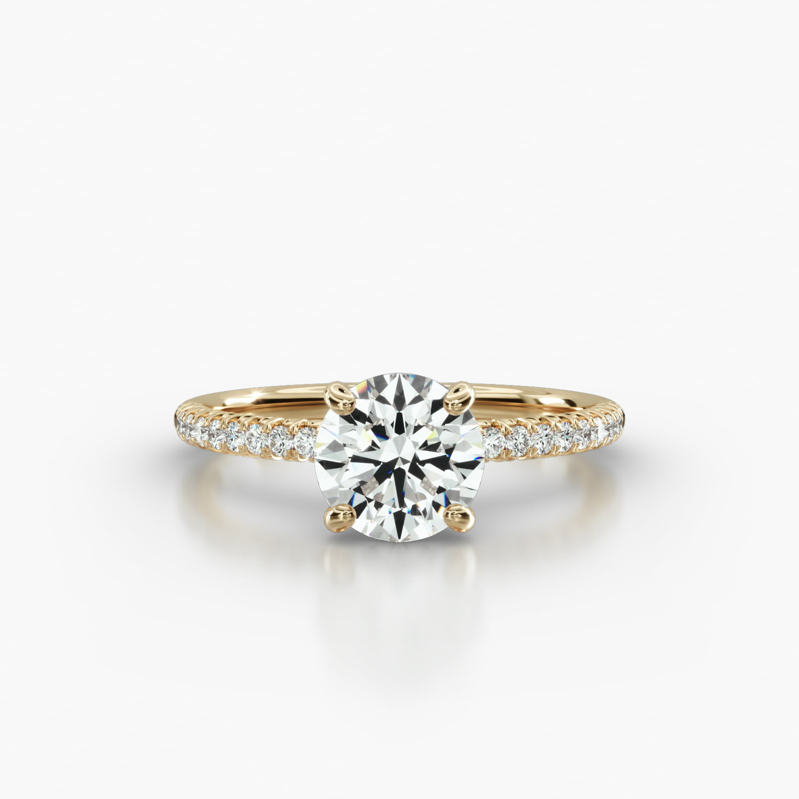 Petite French Pavé Engagement Ring Embellished With a Four Prong Signature Head