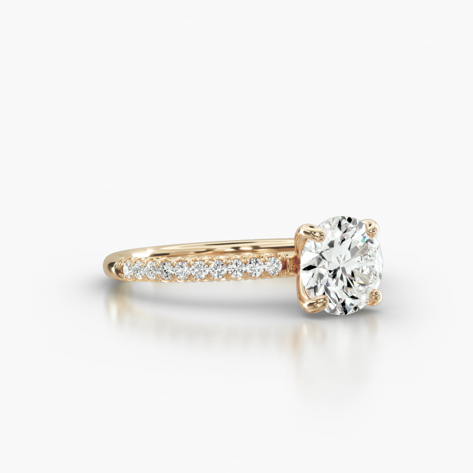 Petite French Pavé Engagement Ring Embellished With a Four Prong Signature Head