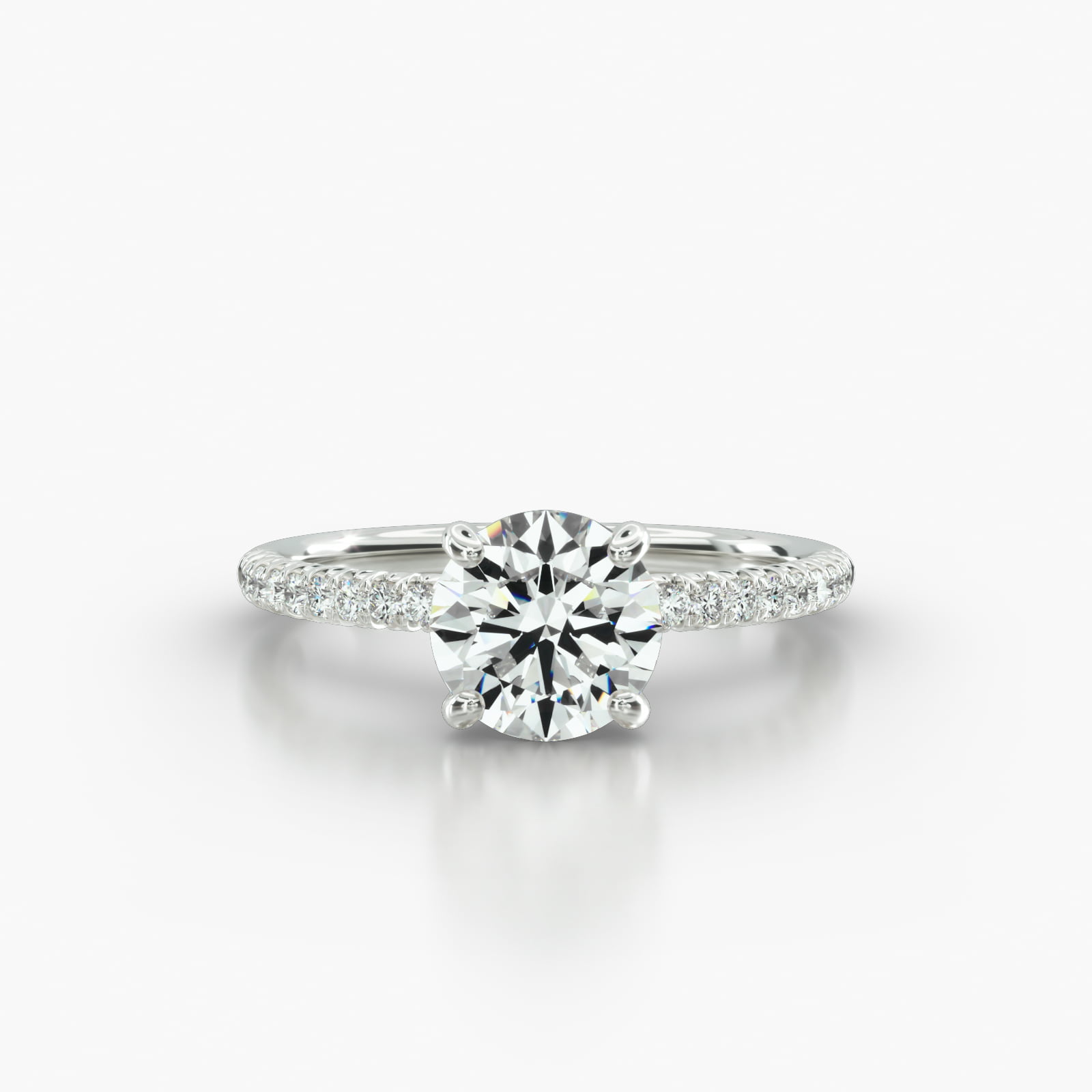Petite French Pavé Engagement Ring Embellished With a Classic Basket Head