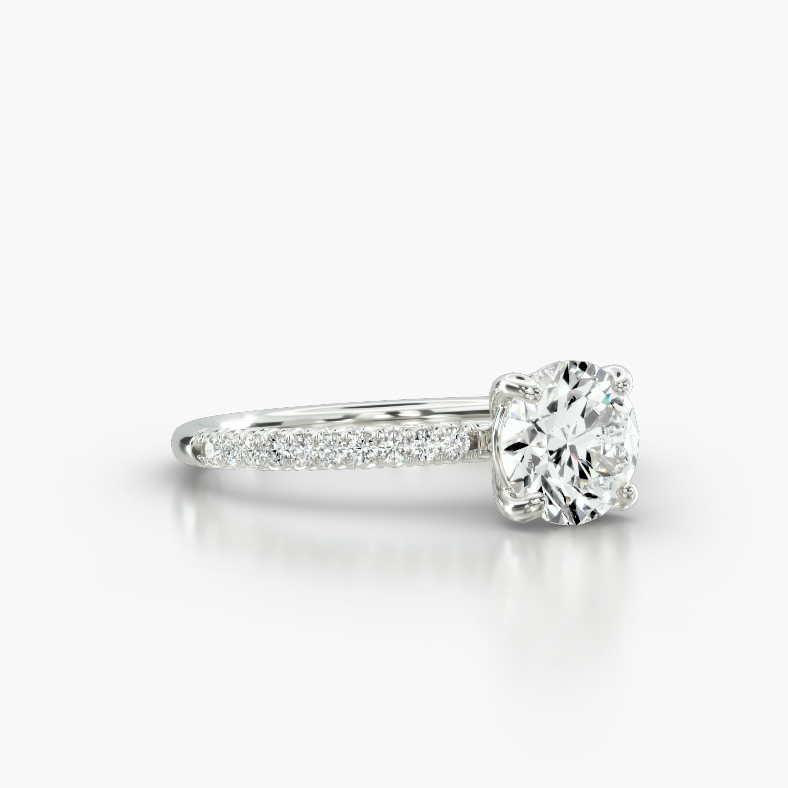 Petite French Pavé Engagement Ring Embellished With a Classic Basket Head