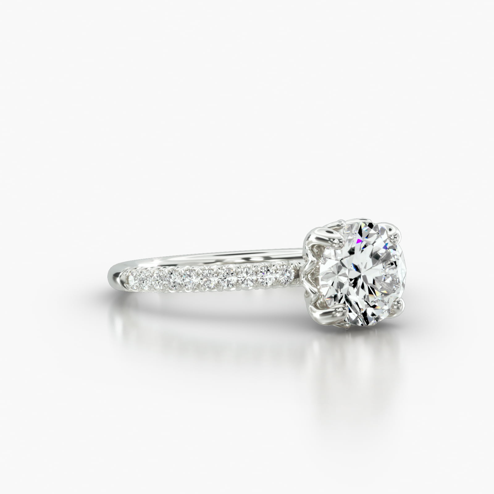 Petite French Pavé Engagement Ring Embellished With a Four Prong Lotus Basket Head