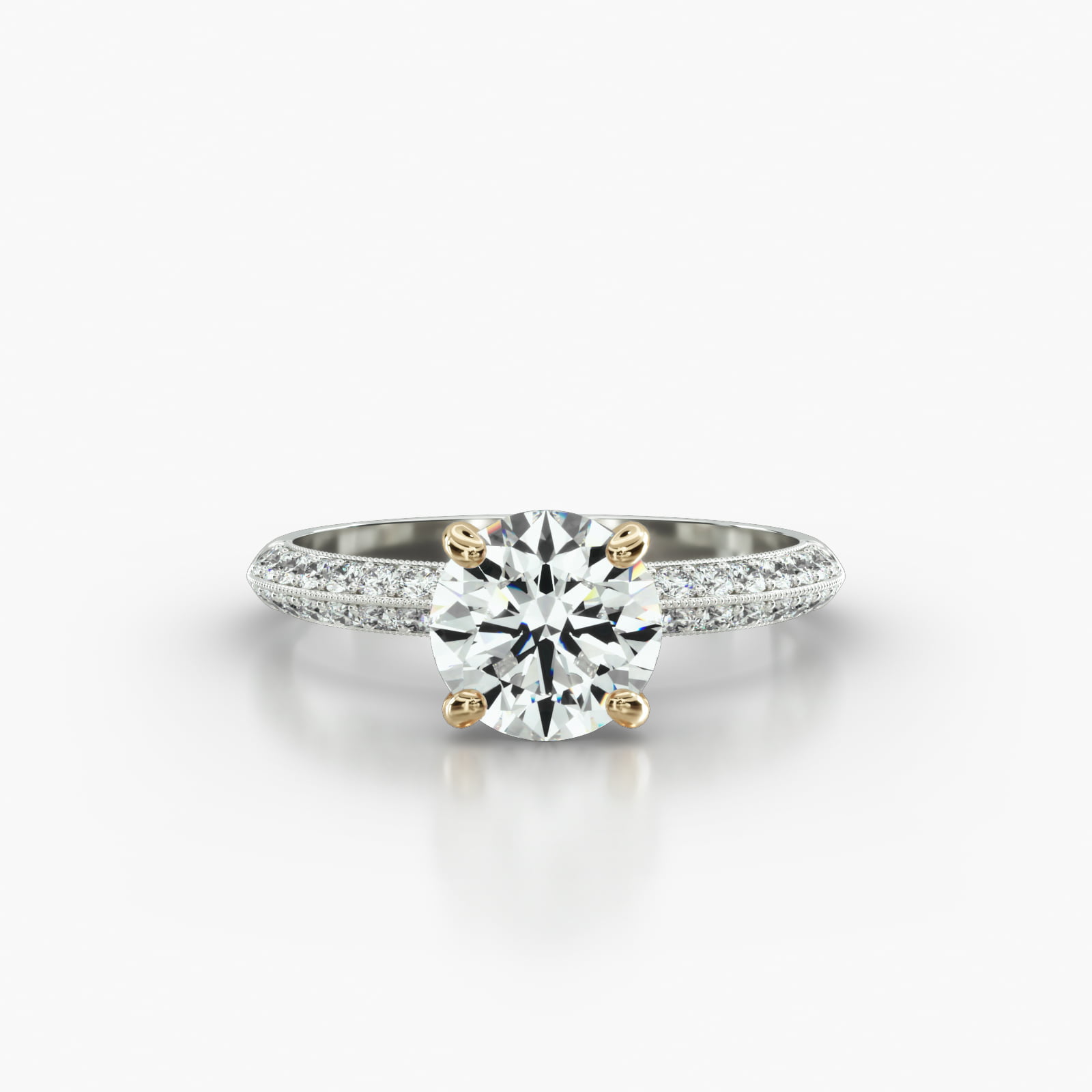 Knife Edge Pavé Engagement Ring Embellished With a Four Prong Signature Head