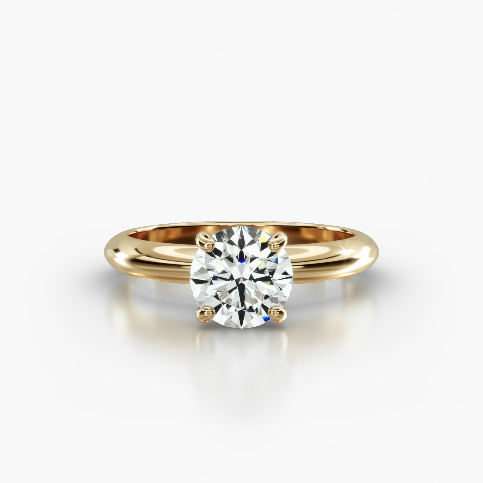 Knife Edge Solitaire Engagement Ring Embellished With a Four Prong Signature Head