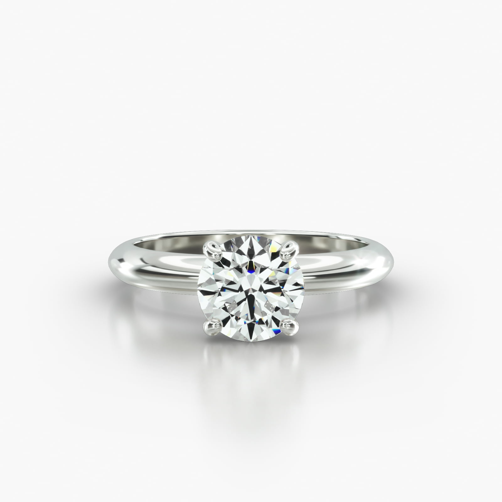 Knife Edge Solitaire Engagement Ring Embellished With a Classic Basket Head