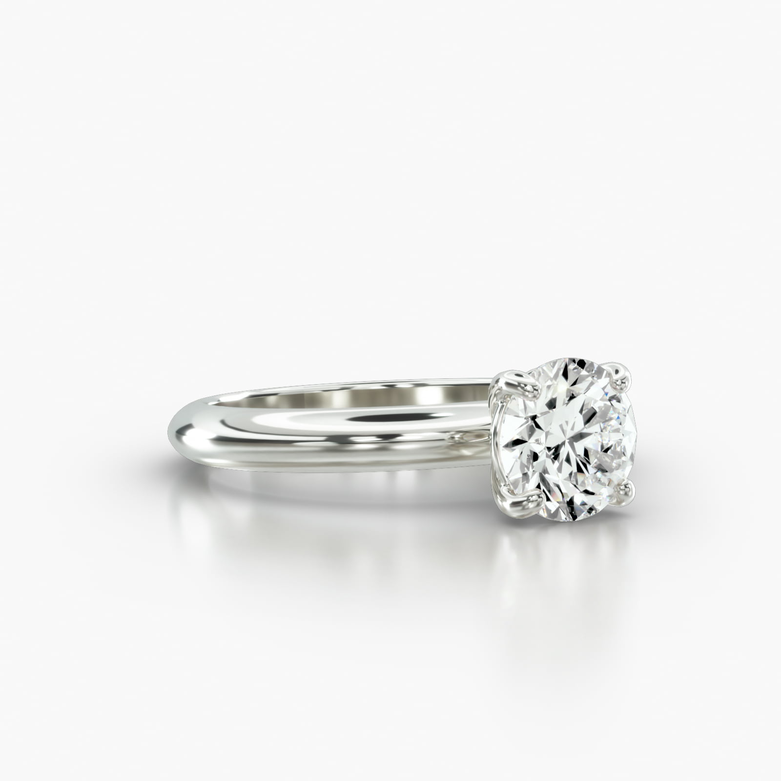 Knife Edge Solitaire Engagement Ring Embellished With a Classic Basket Head