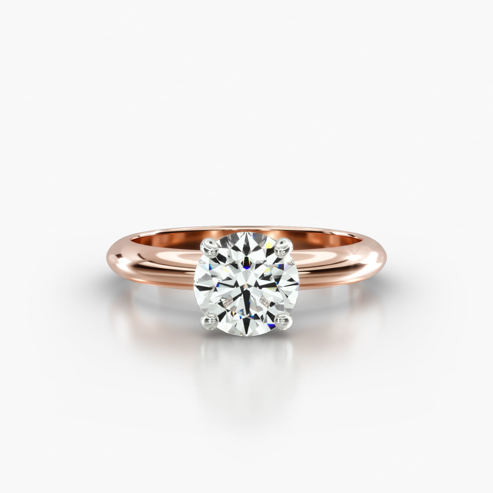 Knife Edge Solitaire Engagement Ring Embellished With a Four Prong Signature Head With Diamond Bridge Accent