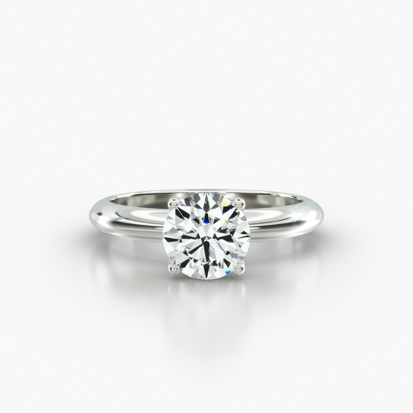 Knife Edge Solitaire Engagement Ring Embellished With a Four Prong Tulip Basket Head