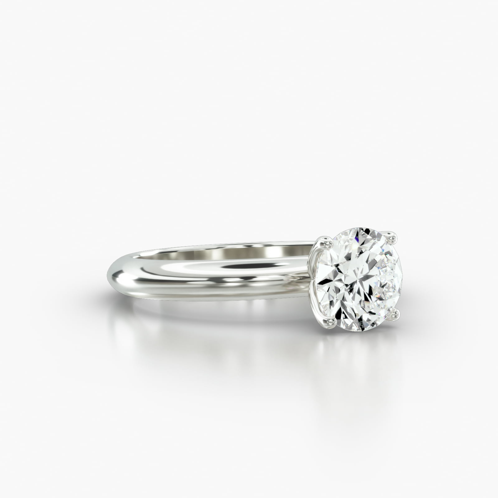 Knife Edge Solitaire Engagement Ring Embellished With a Four Prong Tulip Basket Head