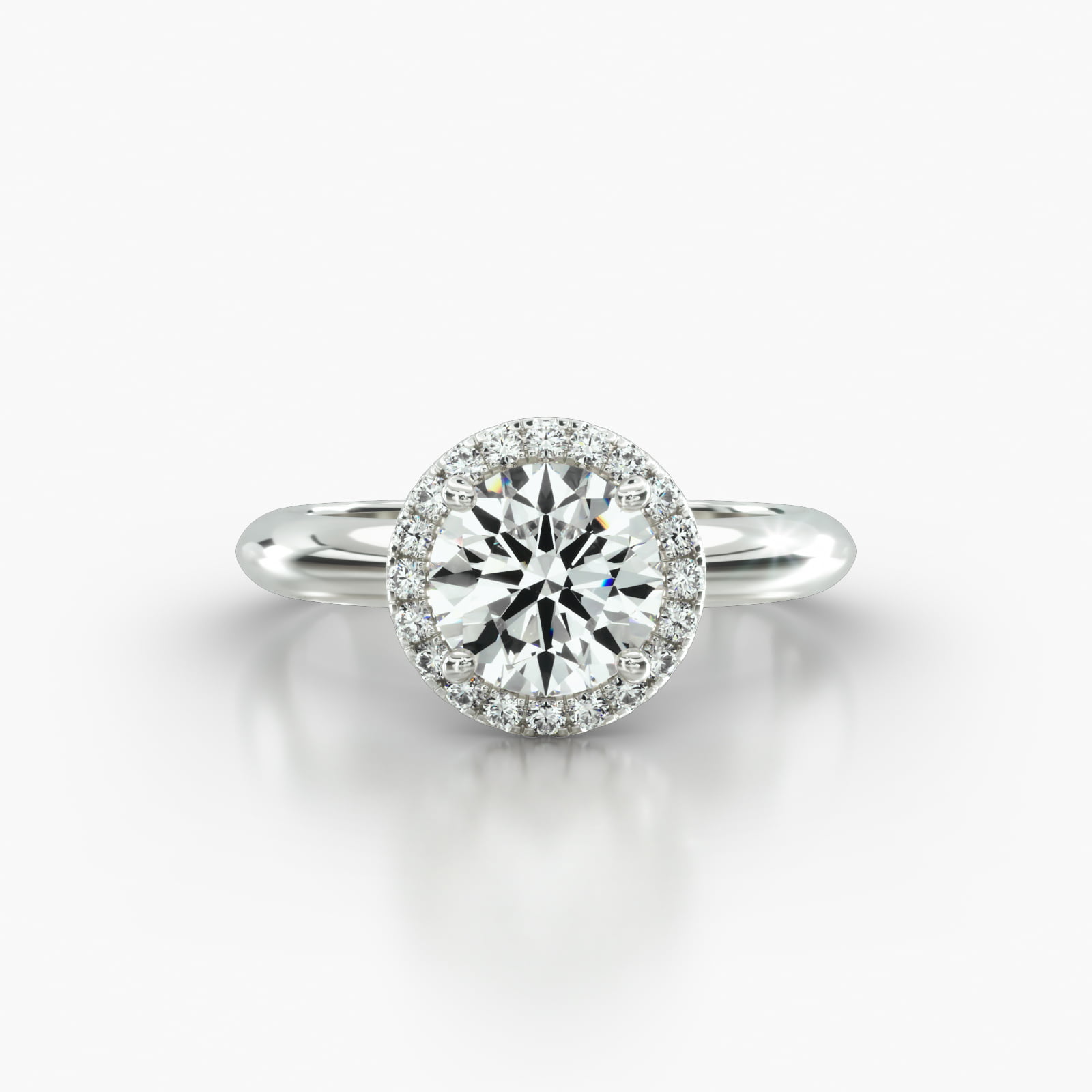Knife Edge Solitaire Engagement Ring Embellished With a Single Row Pavé Halo Head