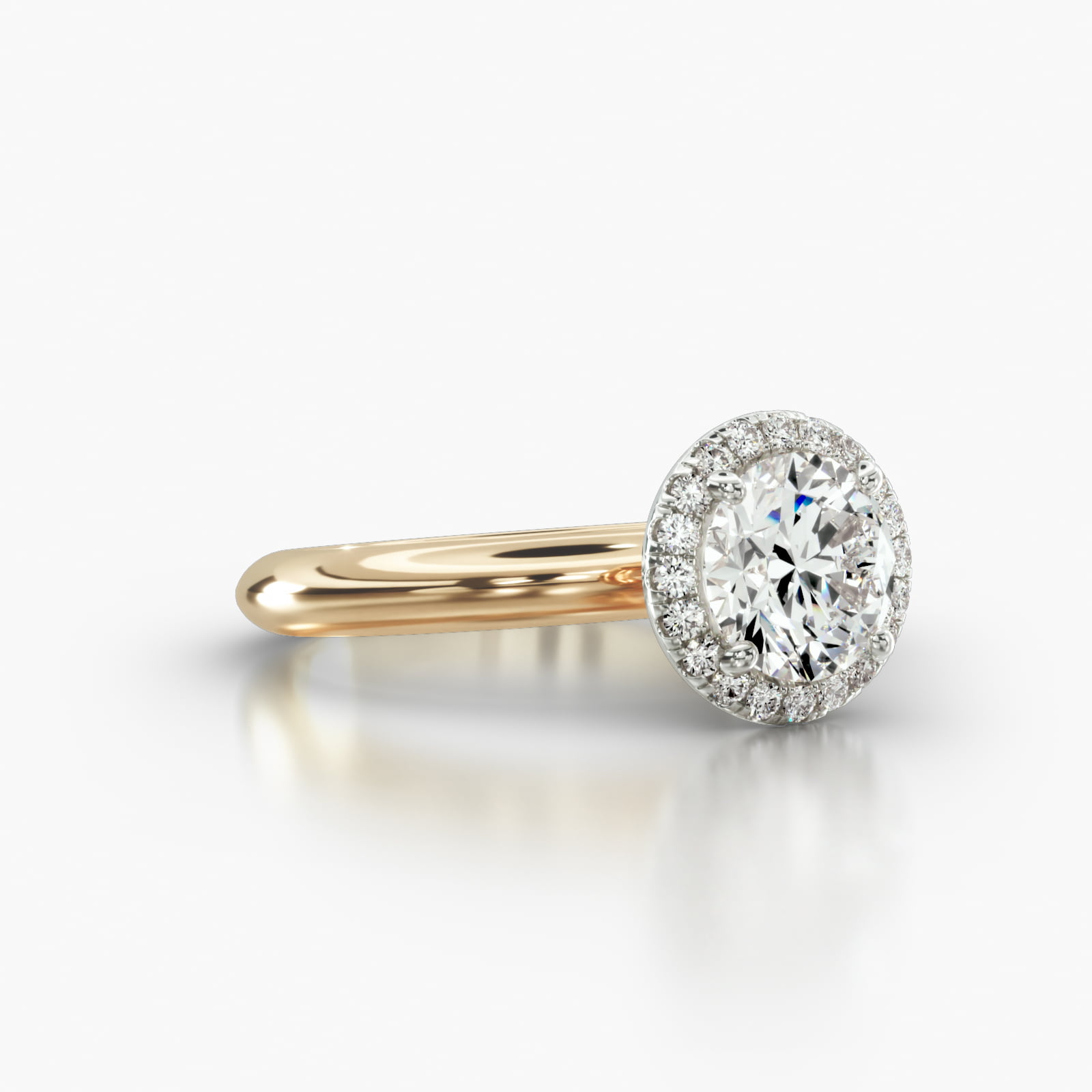 Knife Edge Solitaire Engagement Ring Embellished With a Single Row Pavé Halo Head