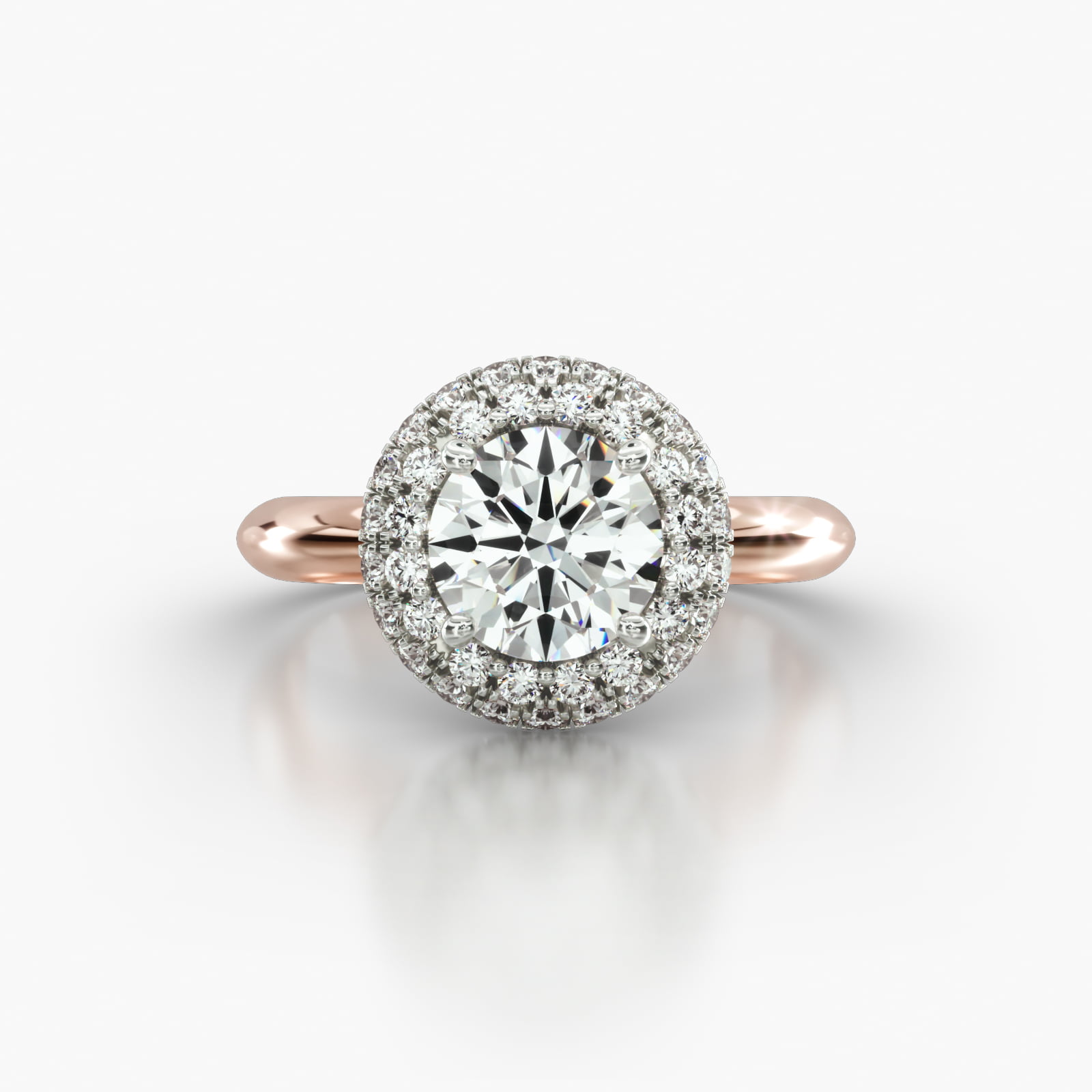 Knife Edge Solitaire Engagement Ring Embellished With a Falling Edge Pavé Halo Head