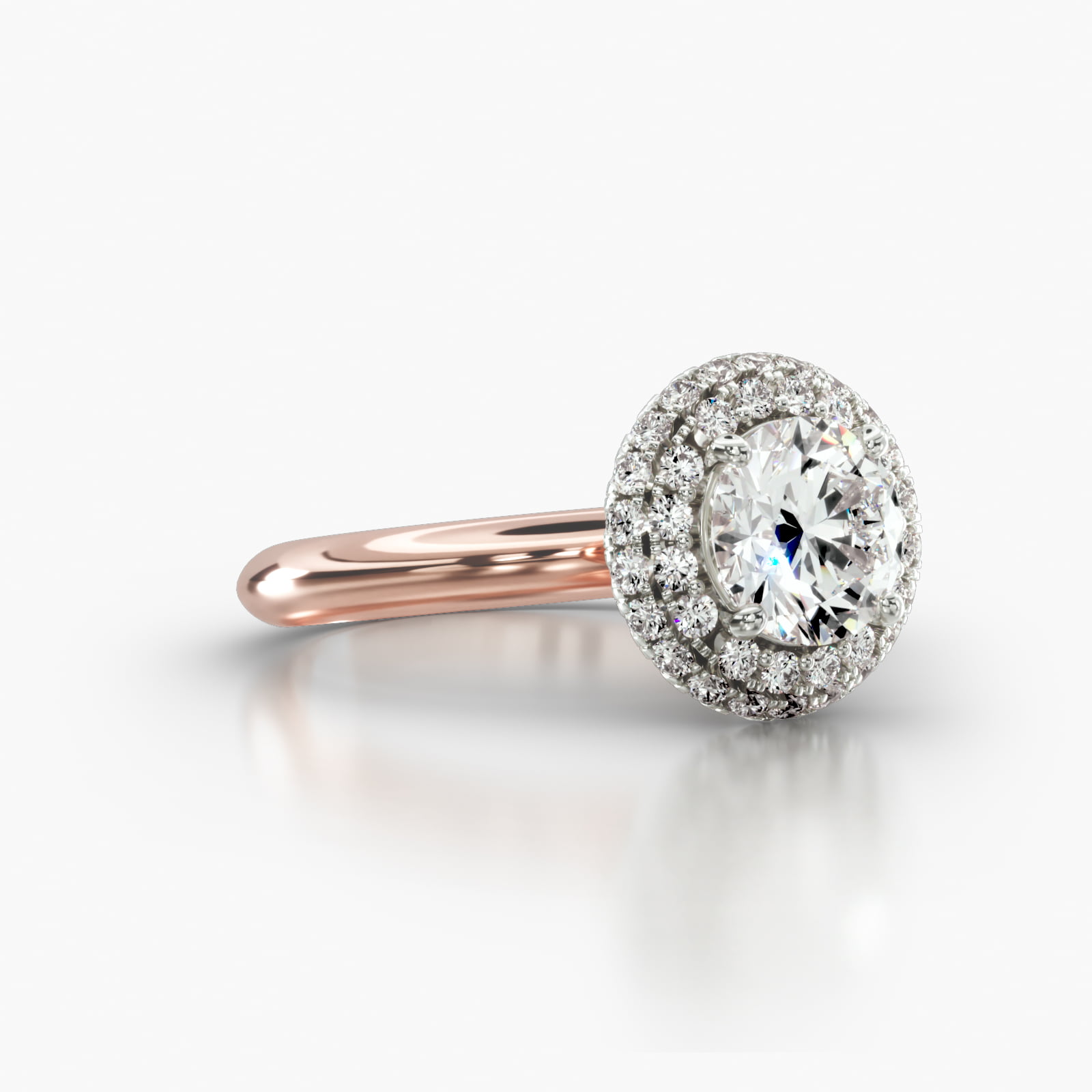 Knife Edge Solitaire Engagement Ring Embellished With a Falling Edge Pavé Halo Head