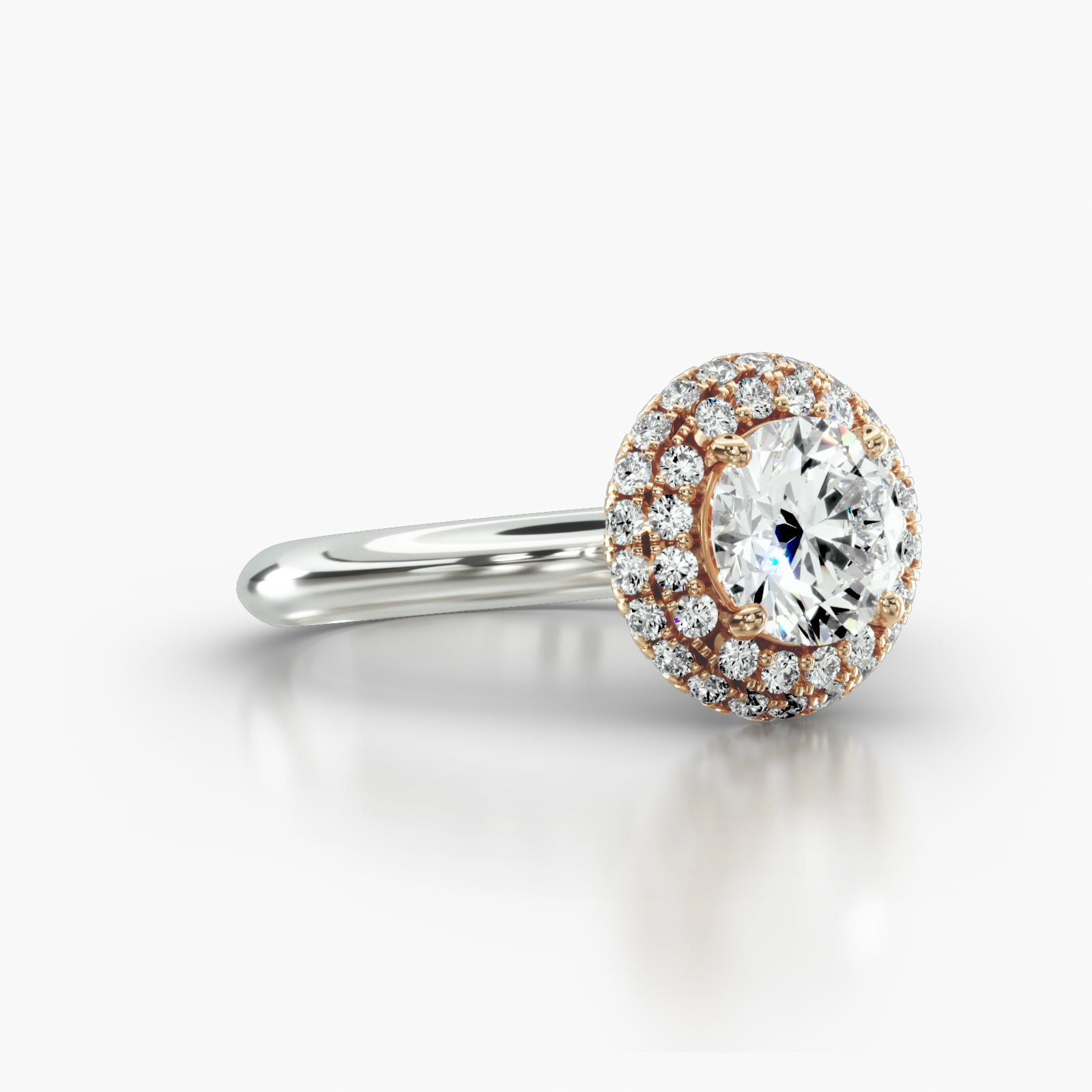 Knife Edge Solitaire Engagement Ring Embellished With a Falling Edge Pavé Halo Head