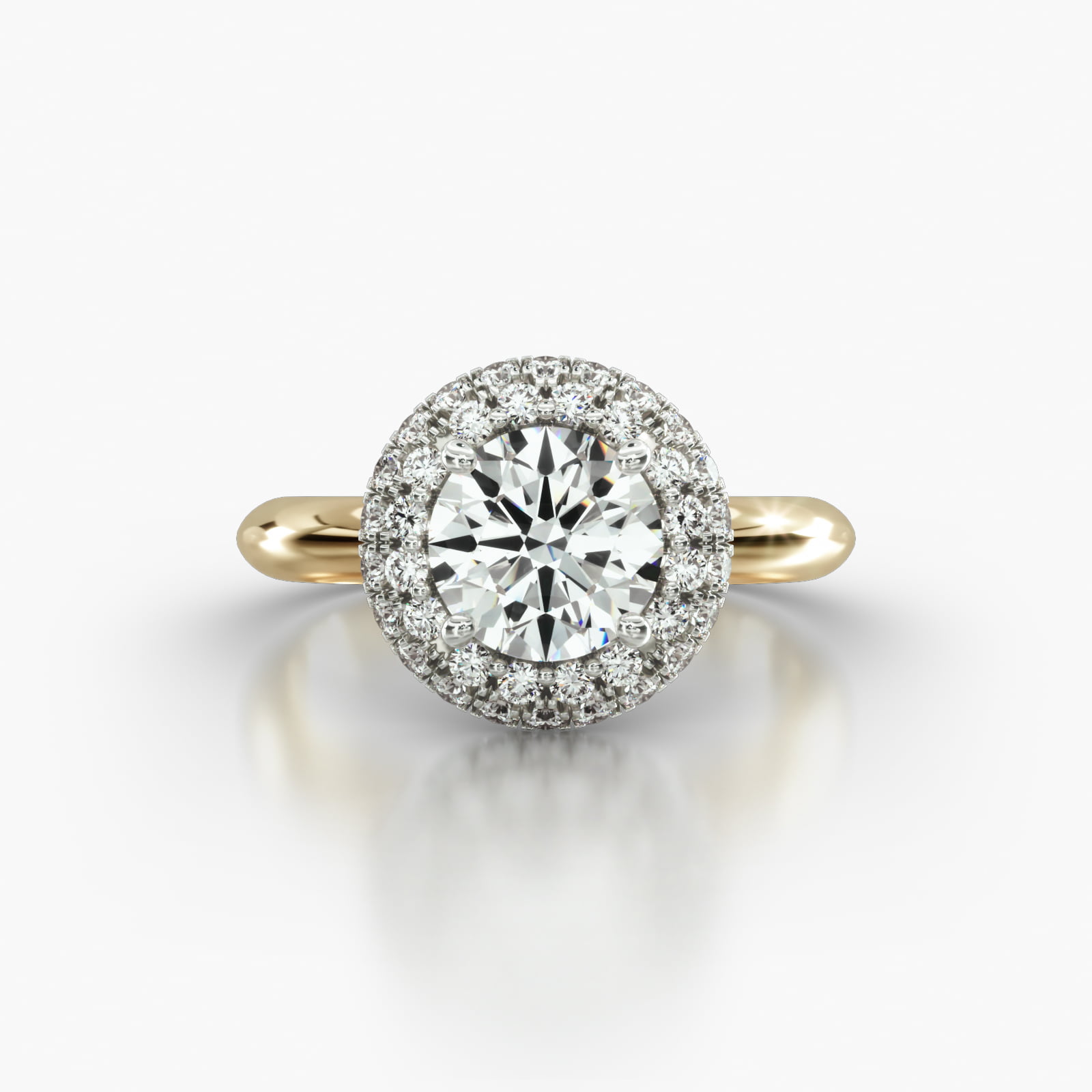 Knife Edge Solitaire Engagement Ring Embellished With a Falling Edge Pavé Halo Head